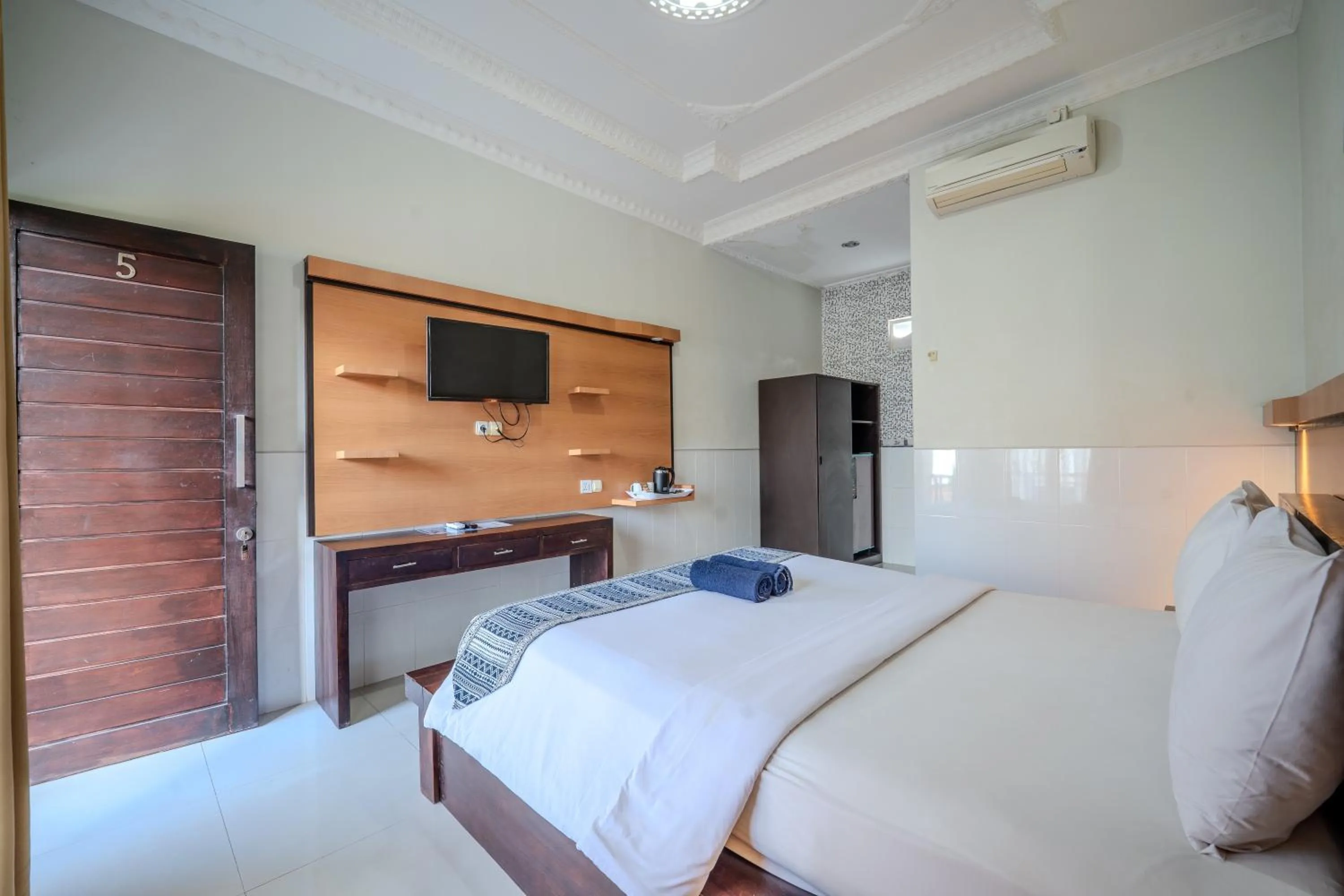 Communal lounge/ TV room, Bed in Wana Kubu Homestay