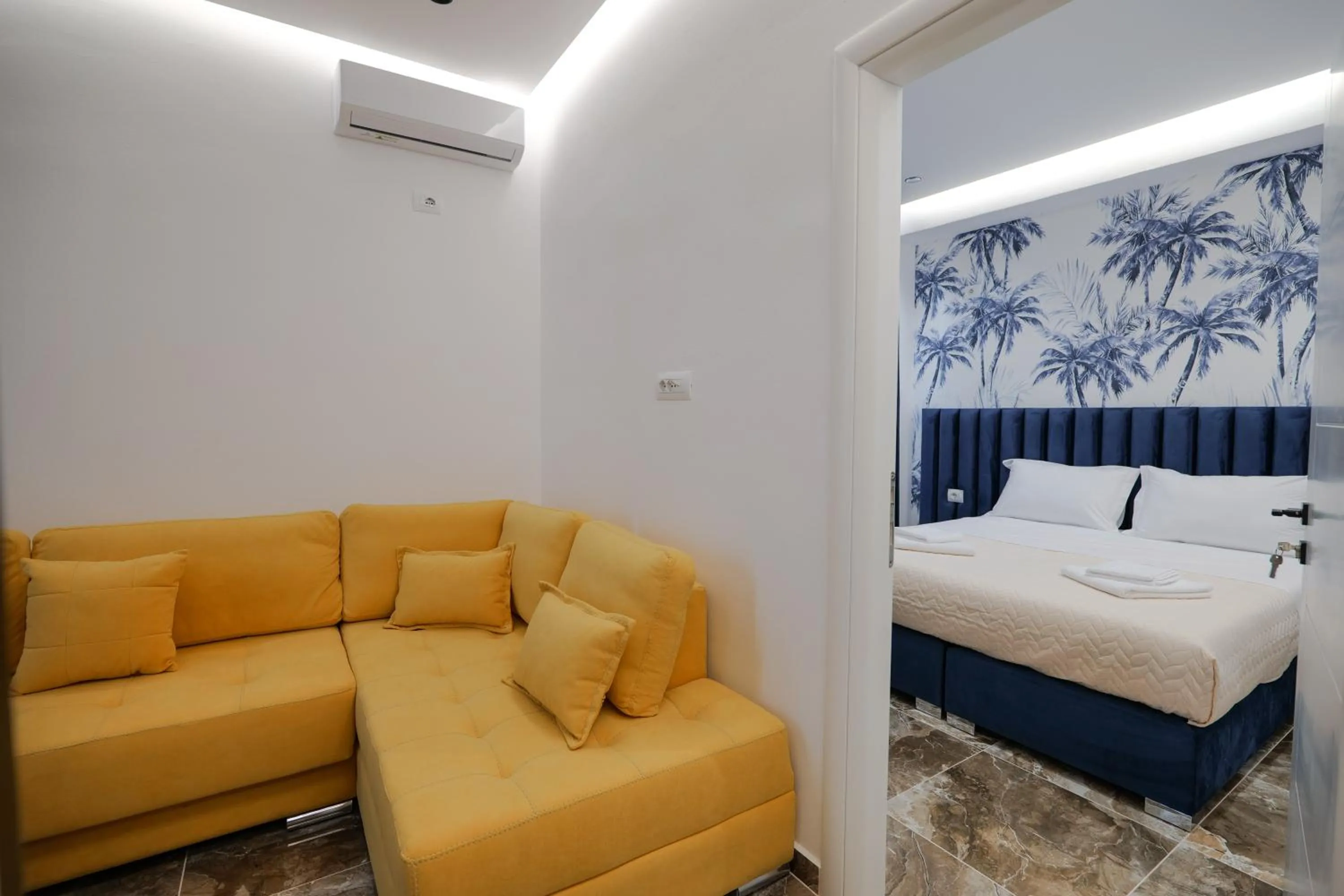 Living room, Bed in La Maison Boutique Hotel