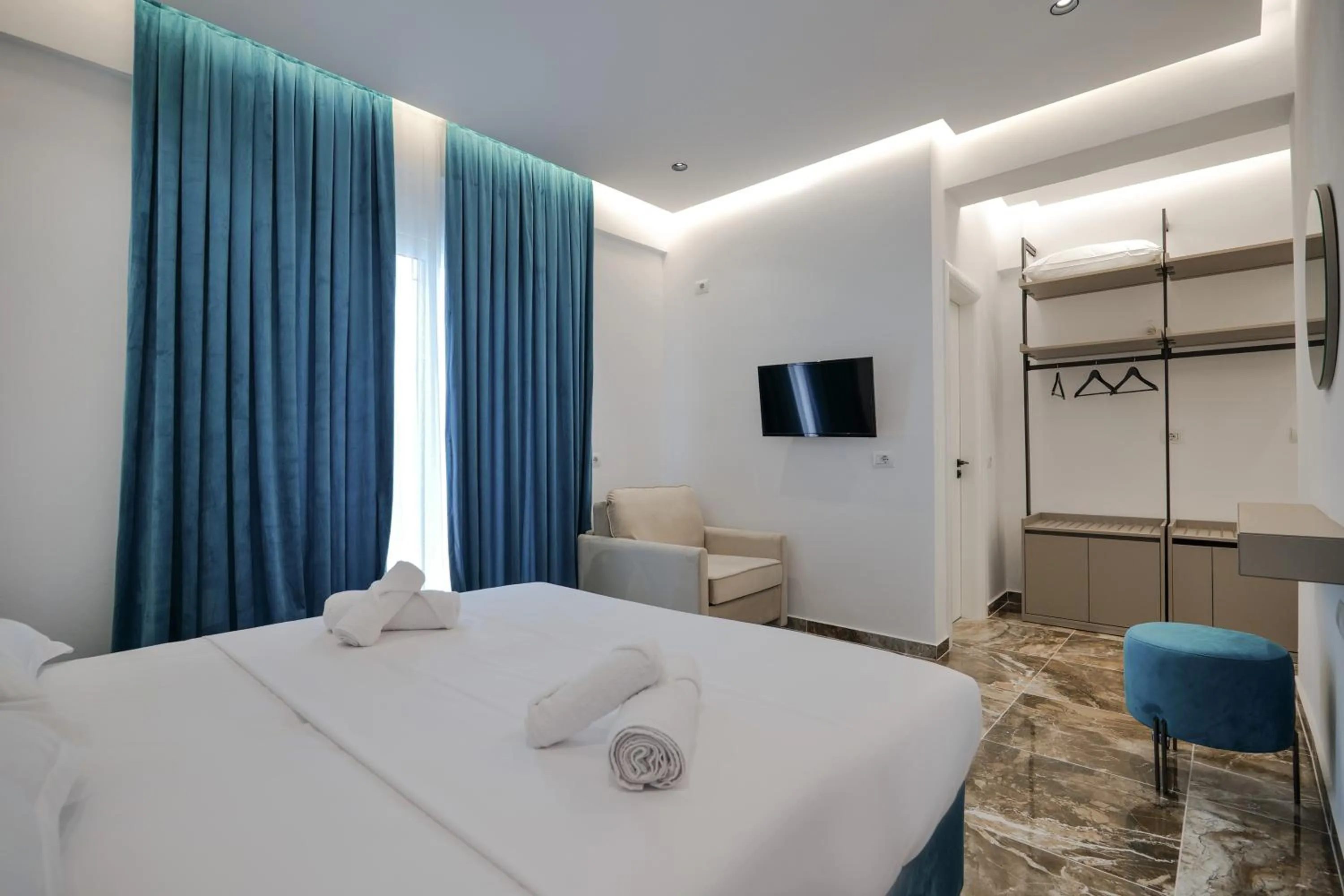 Bed in La Maison Boutique Hotel