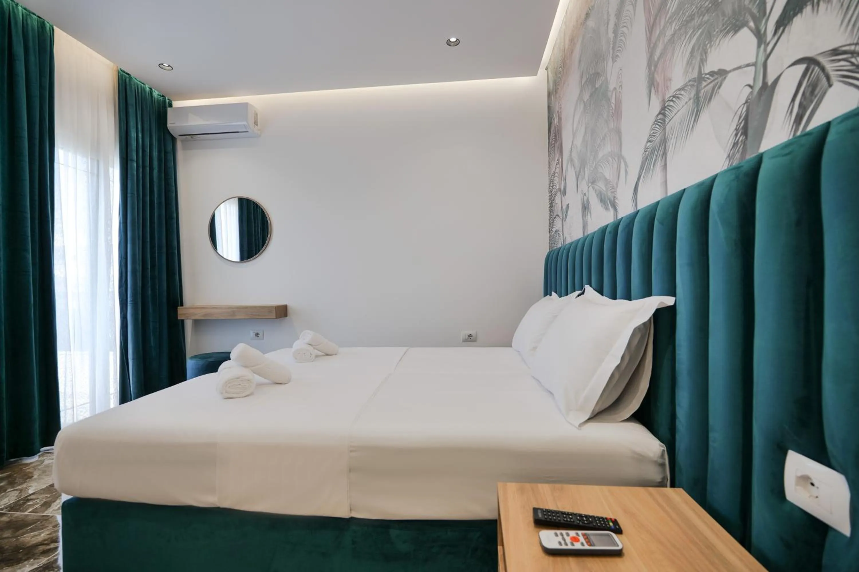 Bed in La Maison Boutique Hotel