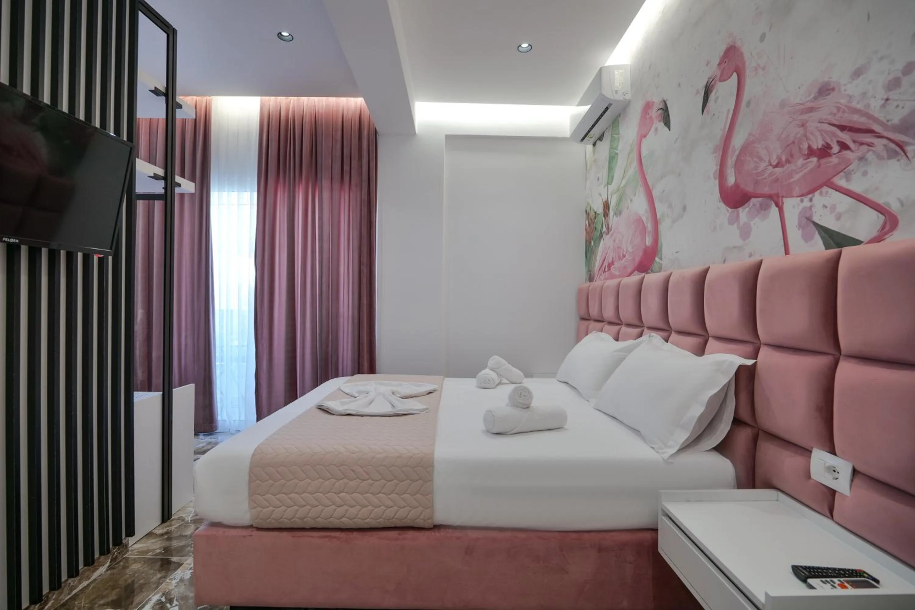 Bed in La Maison Boutique Hotel