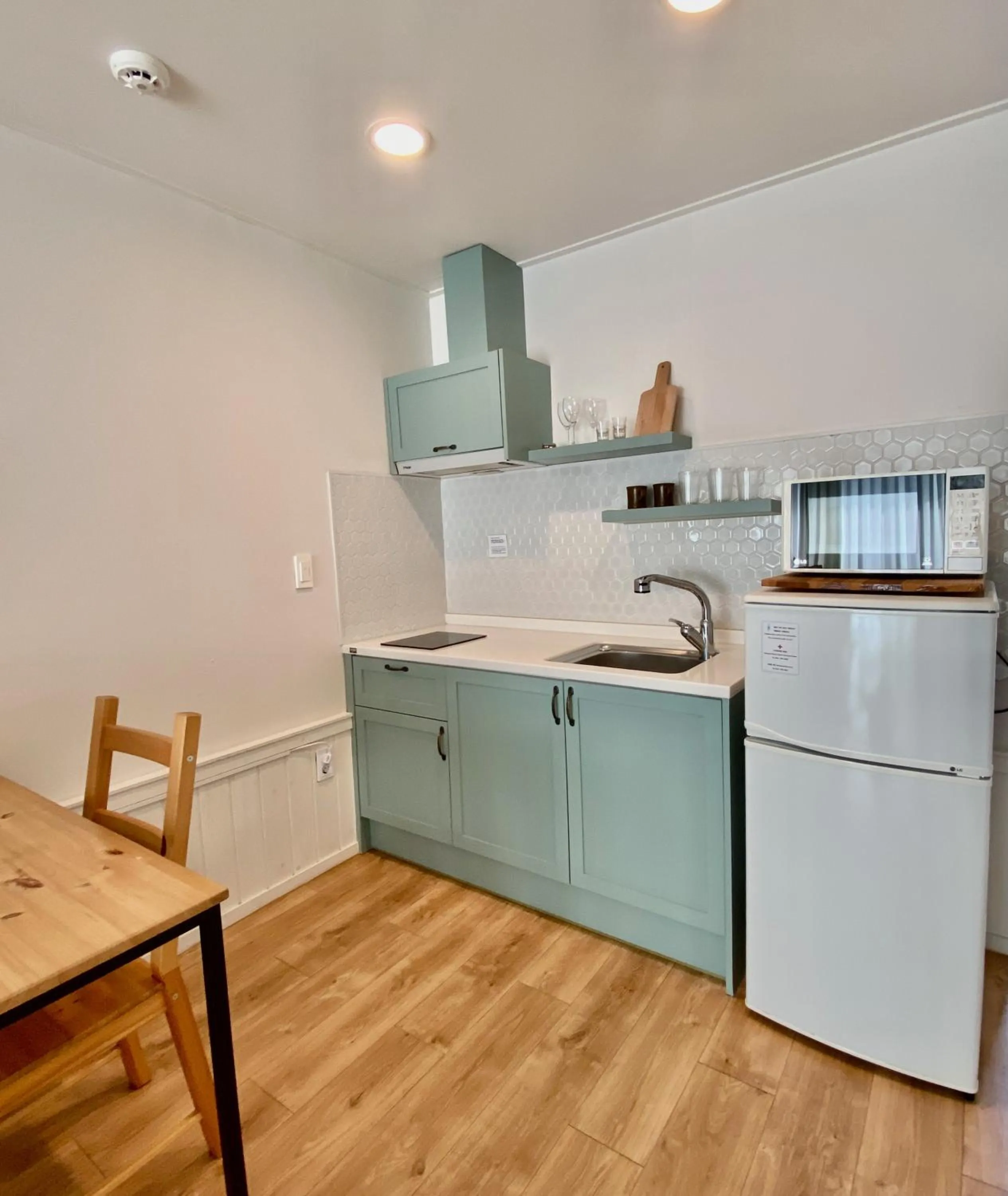 Kitchen or kitchenette in La Pause Pension