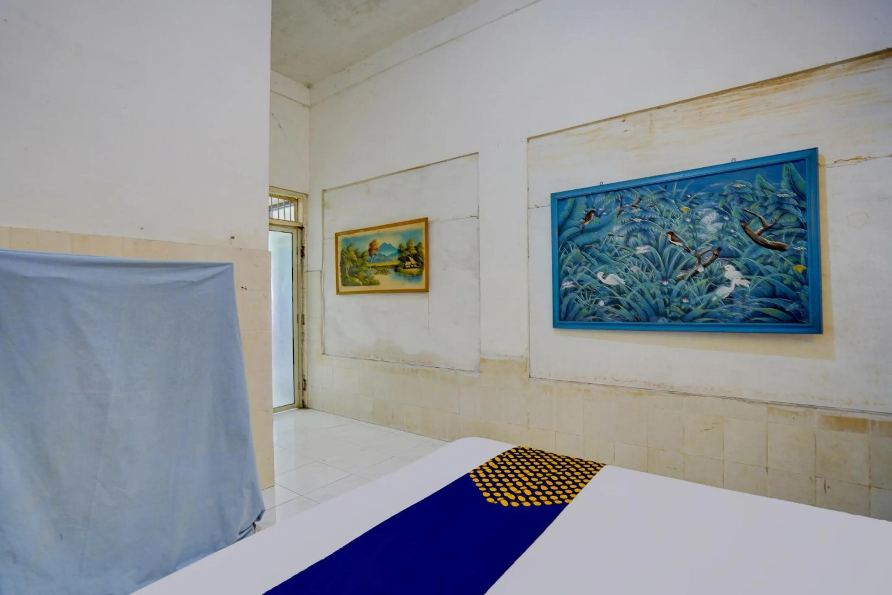 Bedroom, Bed in Hotel O Homestay Kedamean