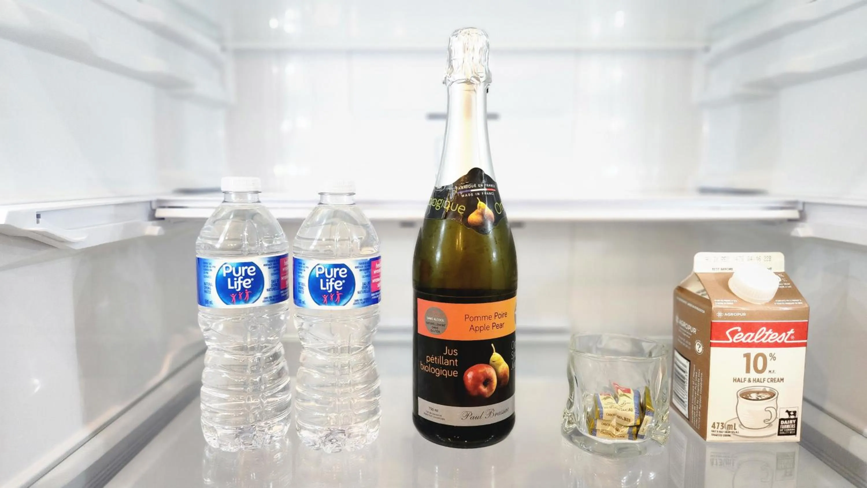 Kitchen or kitchenette in The Cozy Cove Modern King-Bedroom Full Apartment