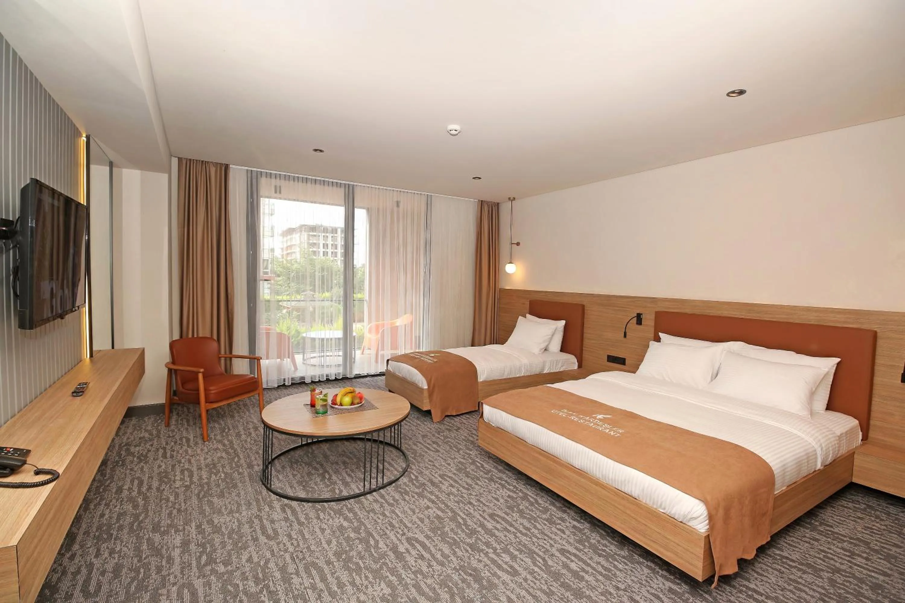 Communal lounge/ TV room, Bed in İnanlar City Hotel