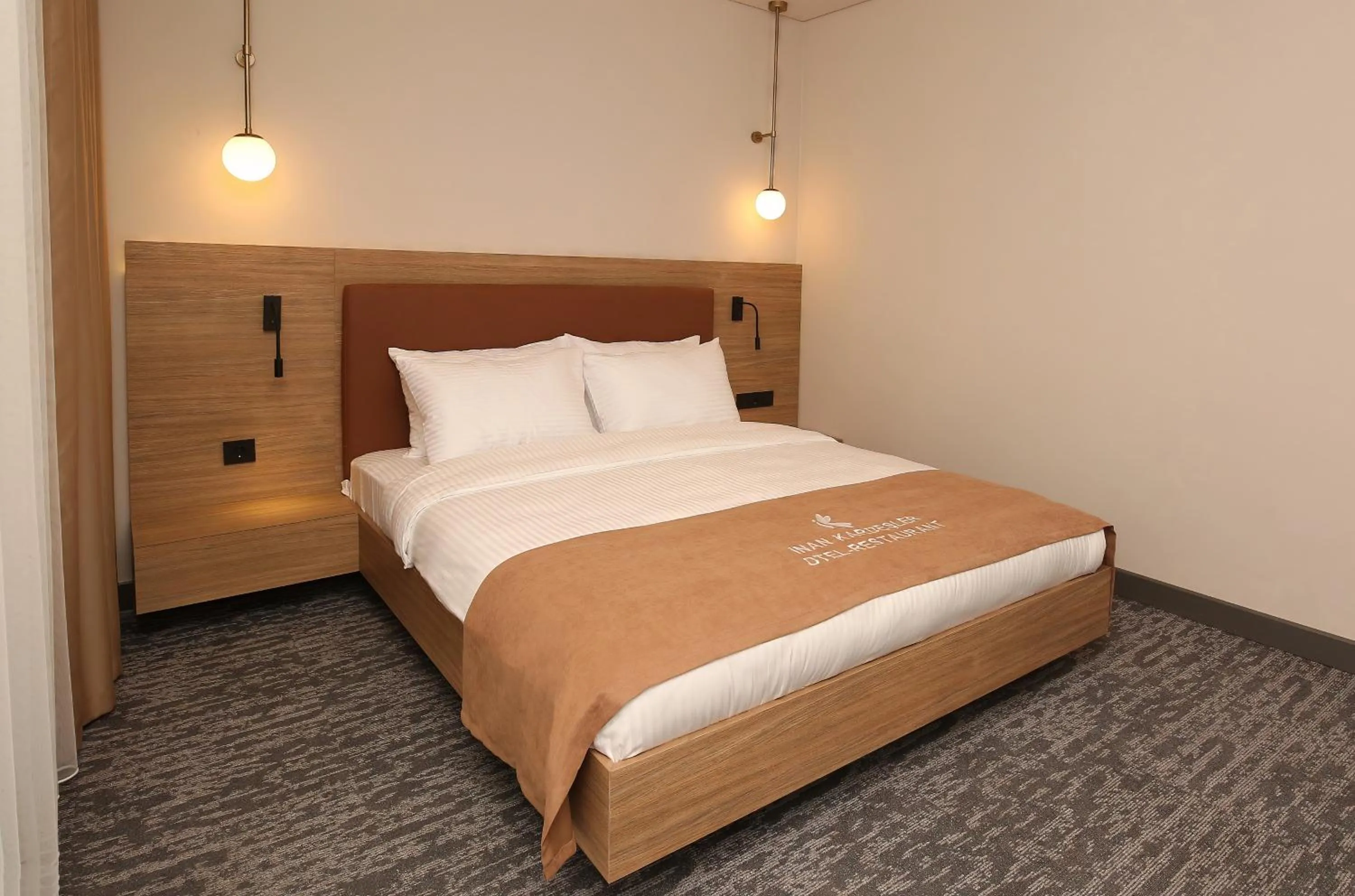 Bed in İnanlar City Hotel