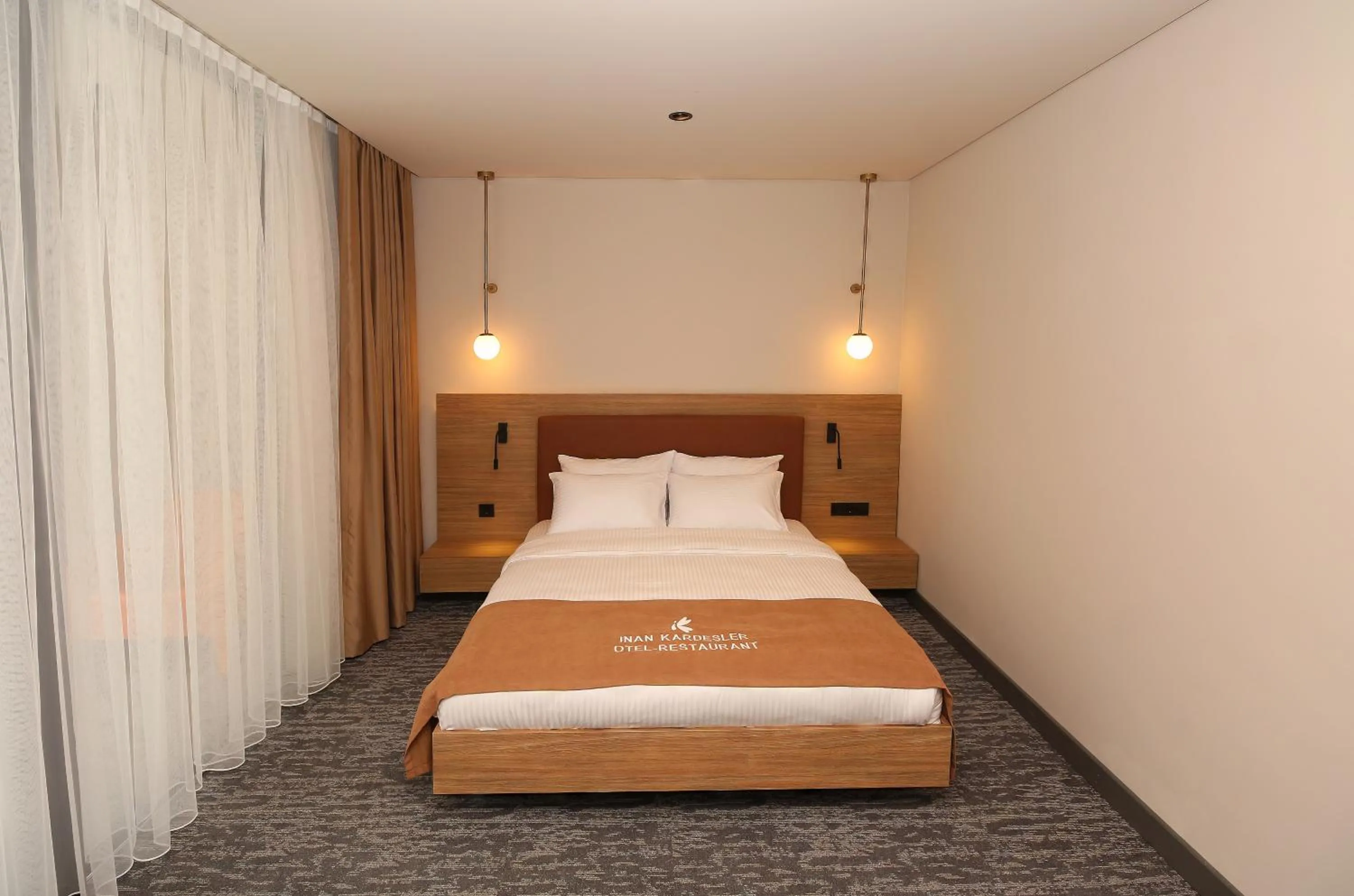 Bed in İnanlar City Hotel