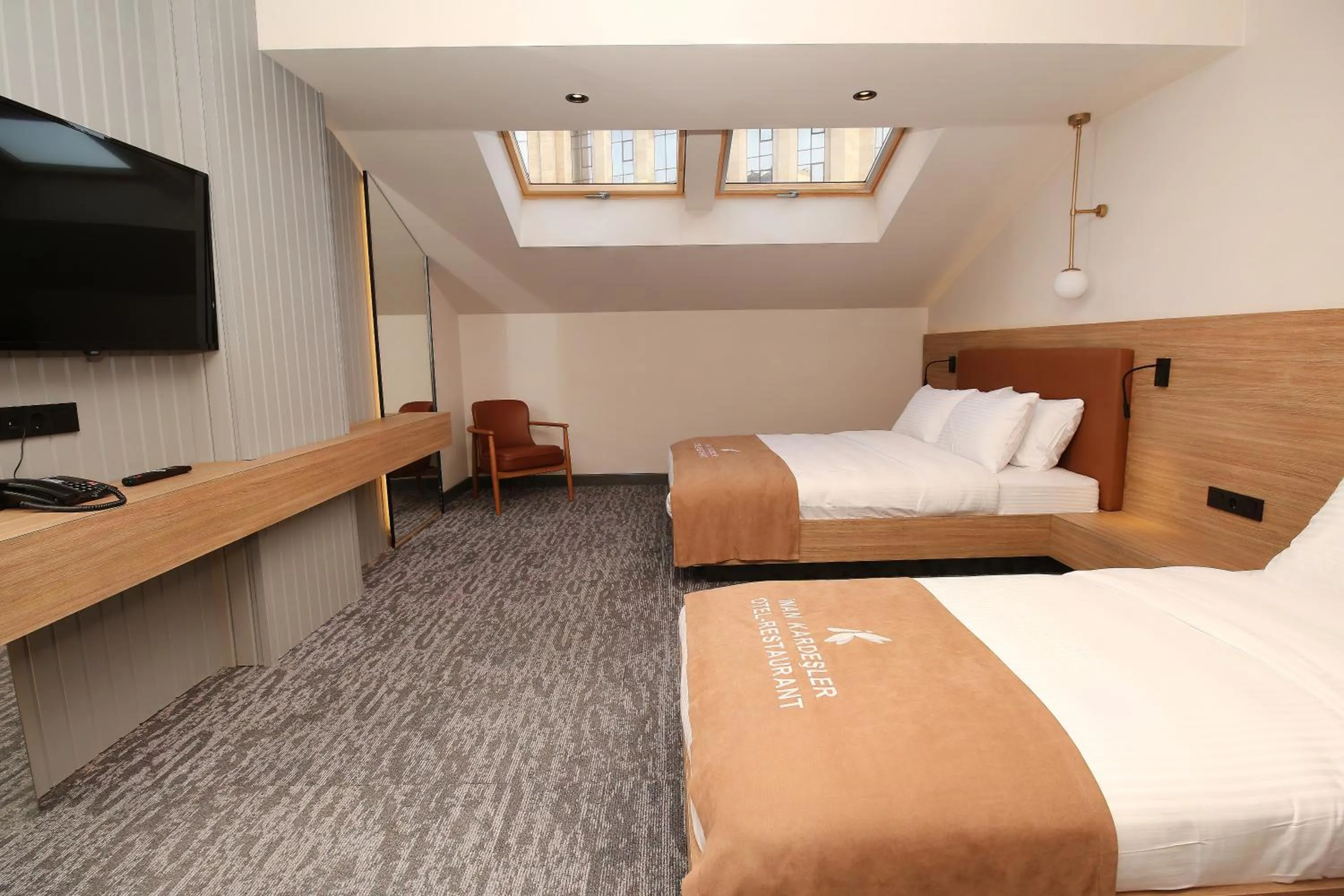 Bed in İnanlar City Hotel