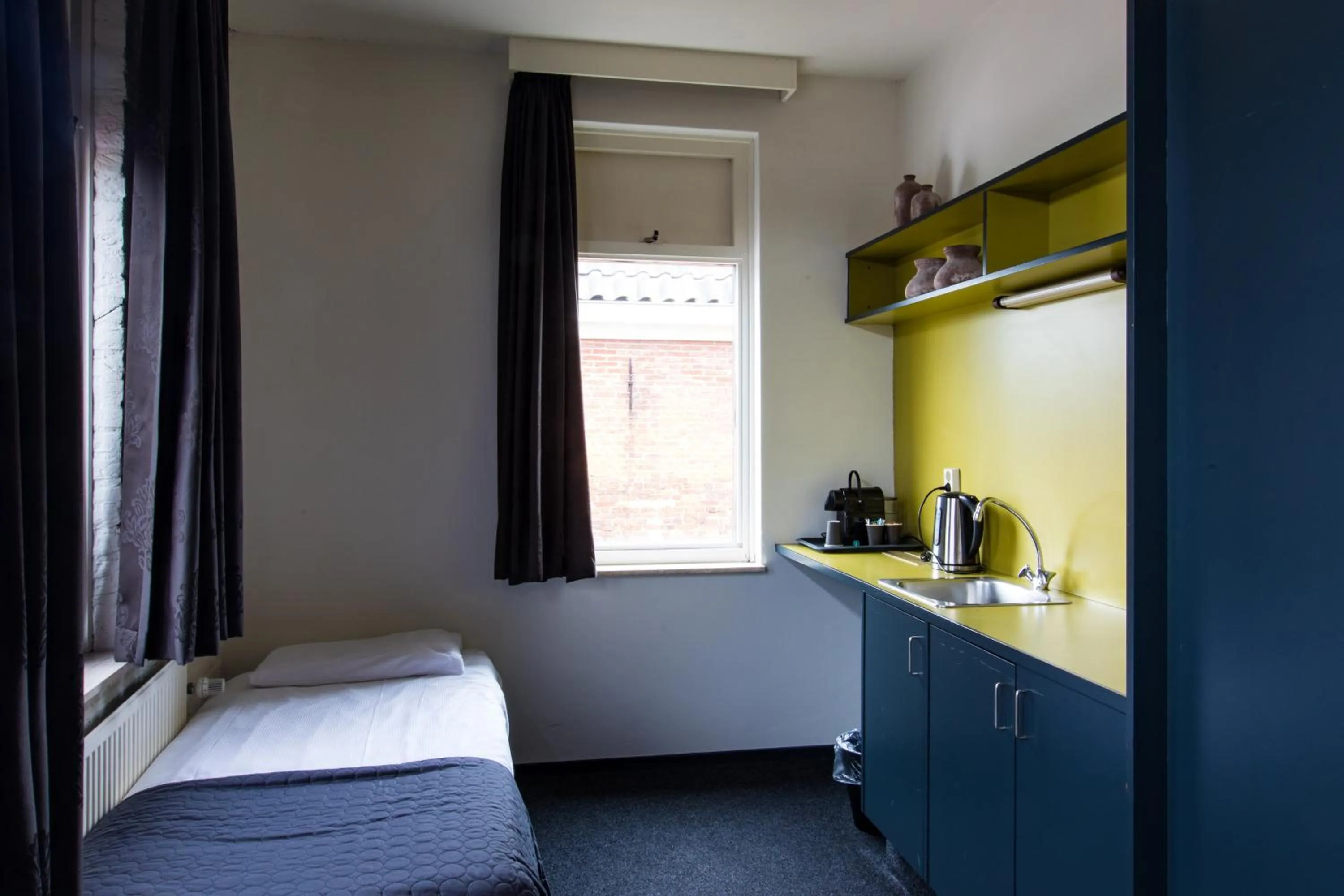 Bed in Hotel Café Restaurant De Posthoorn