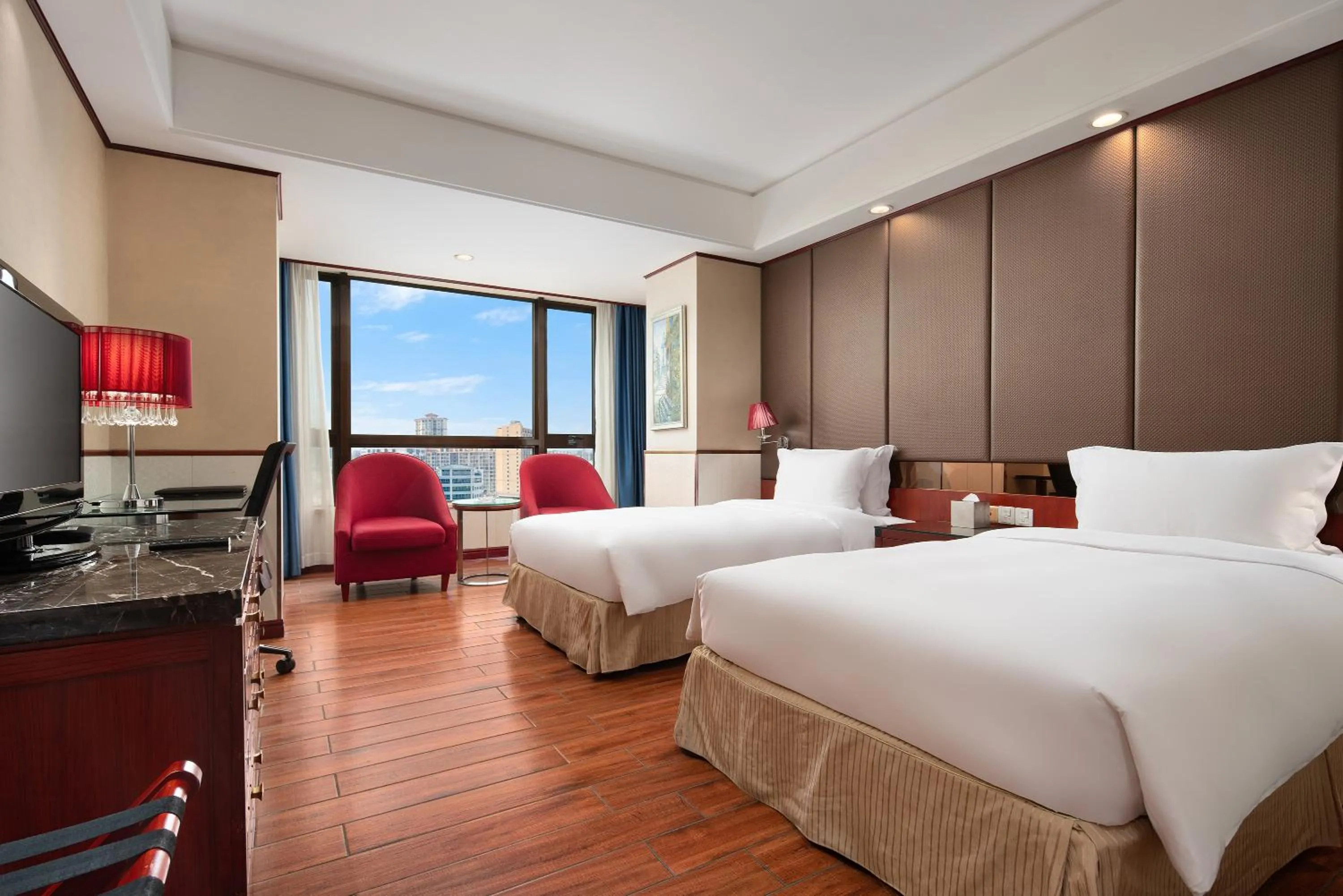 Living room, Bed in Haikou Mingguang Shengyi Hotel