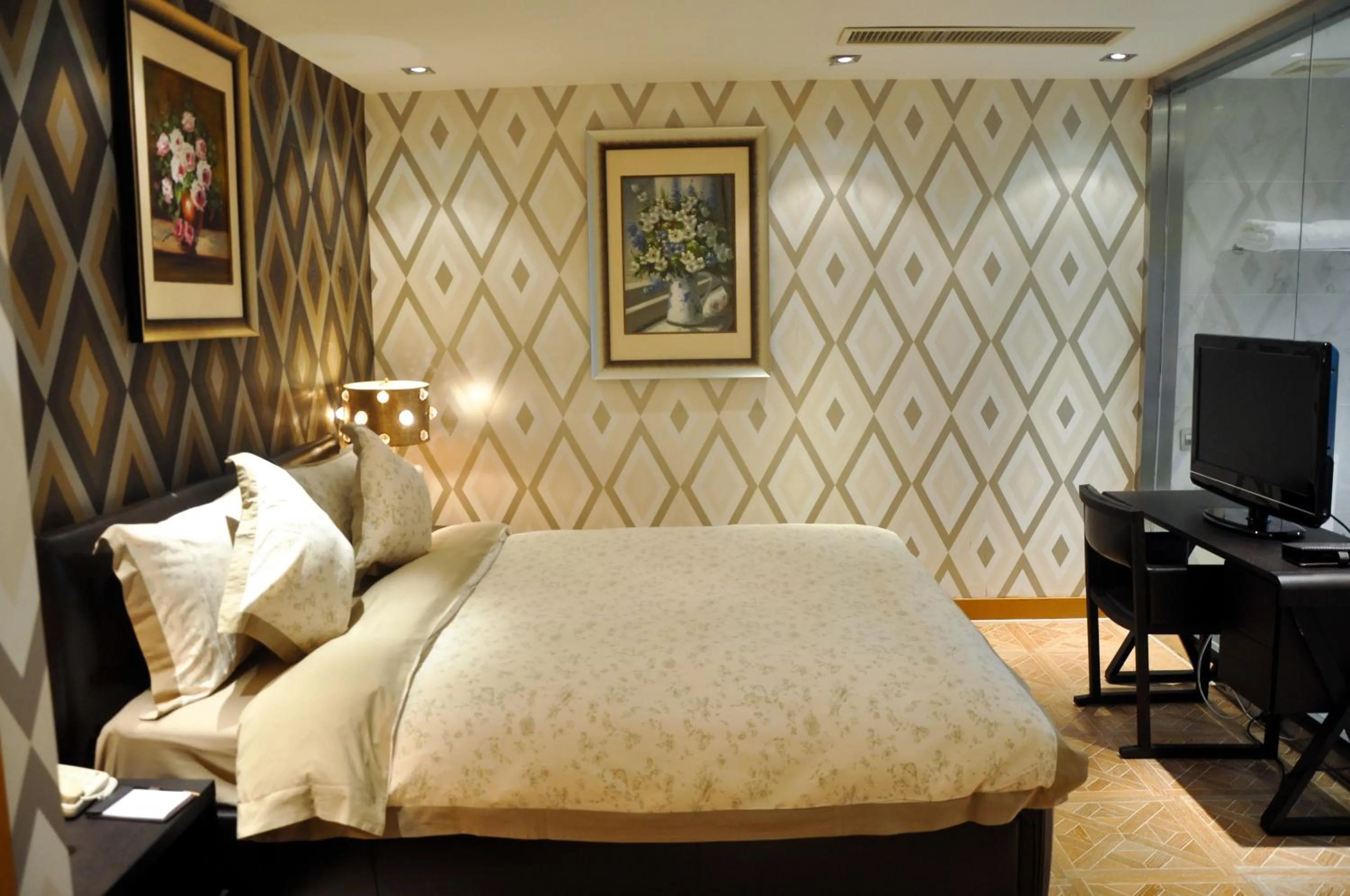 Bed in Haikou Mingguang Shengyi Hotel