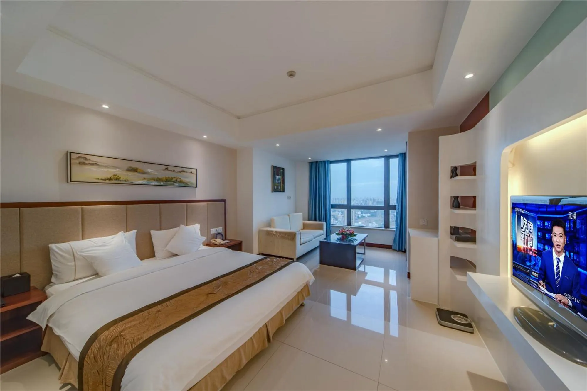 Photo of the whole room, Bed in Haikou Mingguang Shengyi Hotel