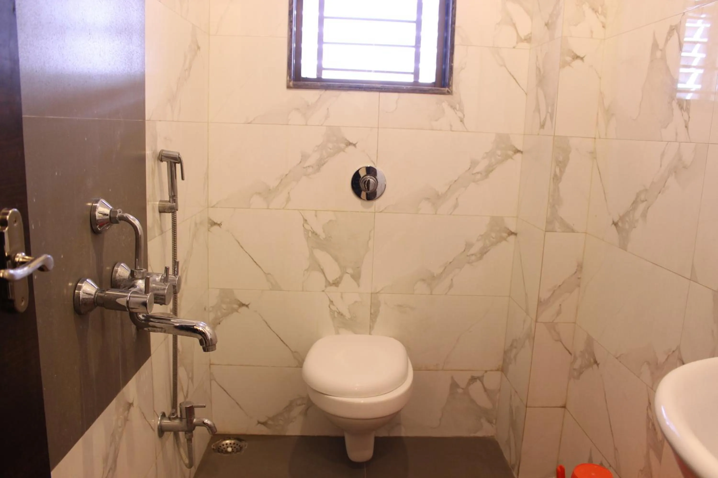 Bathroom in Hotel Sai Ramanand