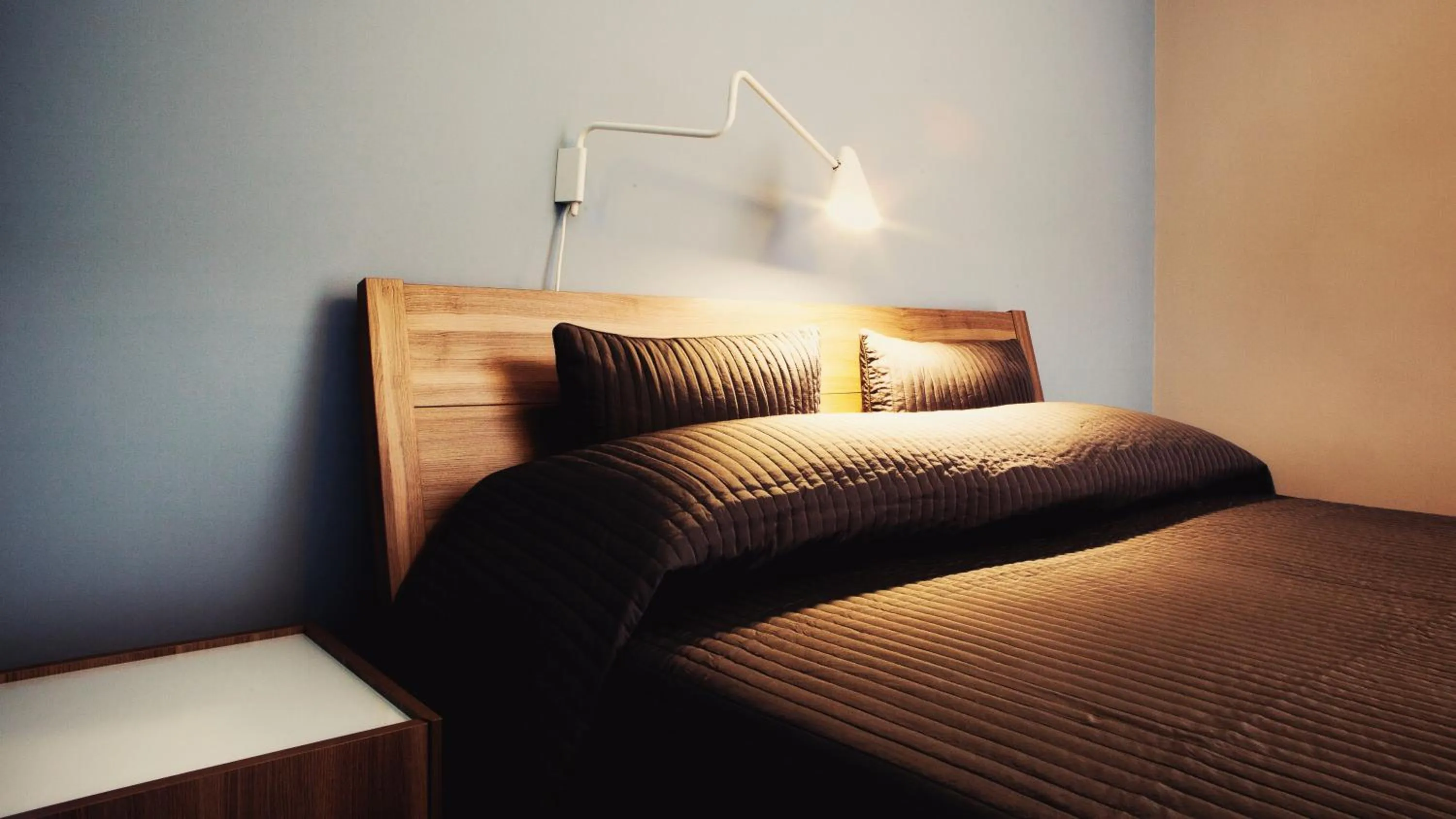 Bed in La Scivola Rooms