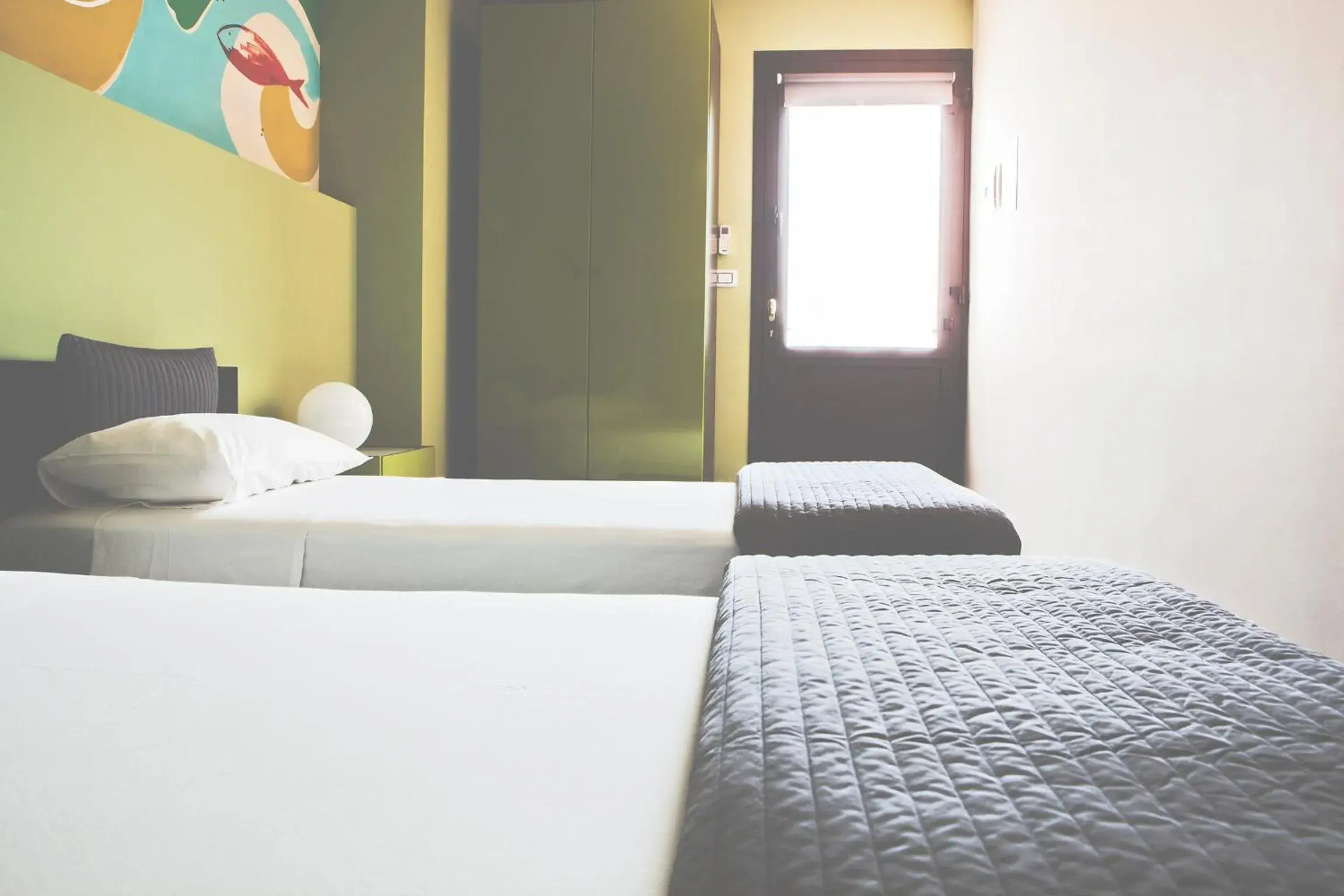 Twin Room with Private Bathroom - single occupancy in La Scivola Rooms Twin Room with Private Bathroom - single occupancy in La Scivola Rooms