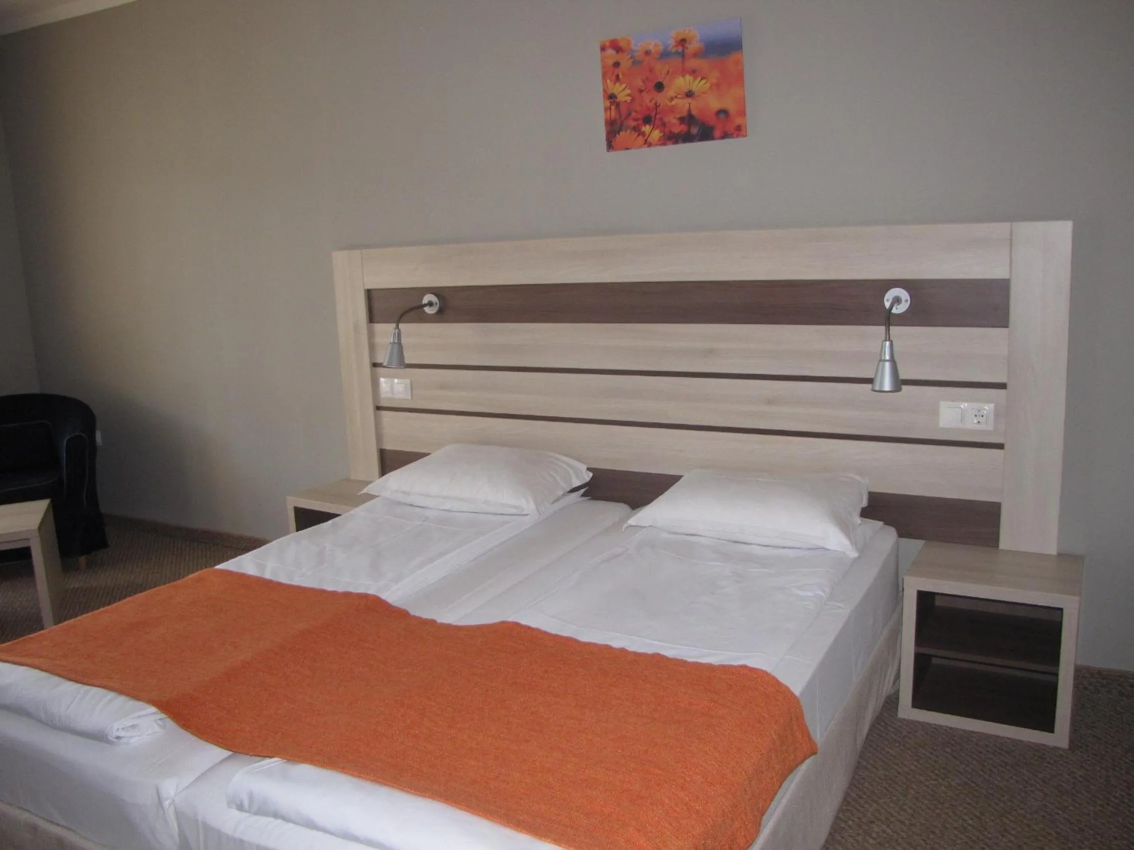 Bed in Blue Orange Beach Resort