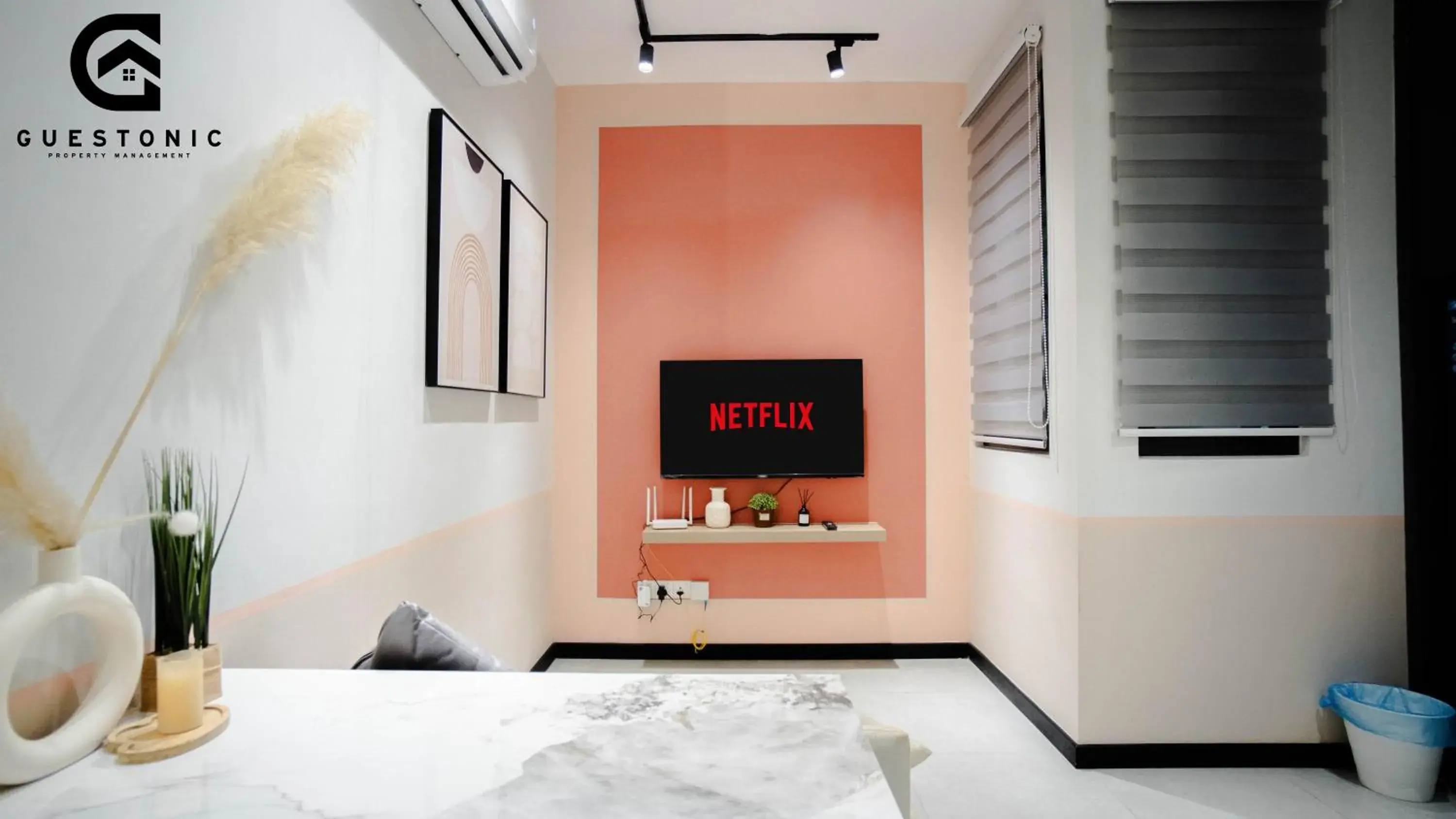 Bed in NeuSuite Cozy Studio by GUESTONIC Bed in NeuSuite Cozy Studio by GUESTONIC