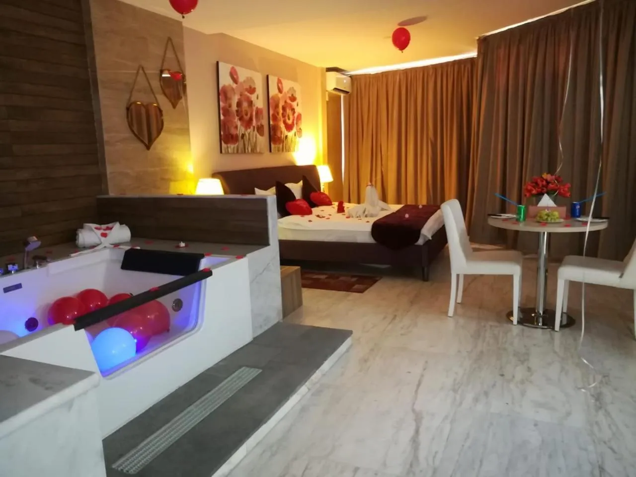 Bed in Delora Hotel and Suites