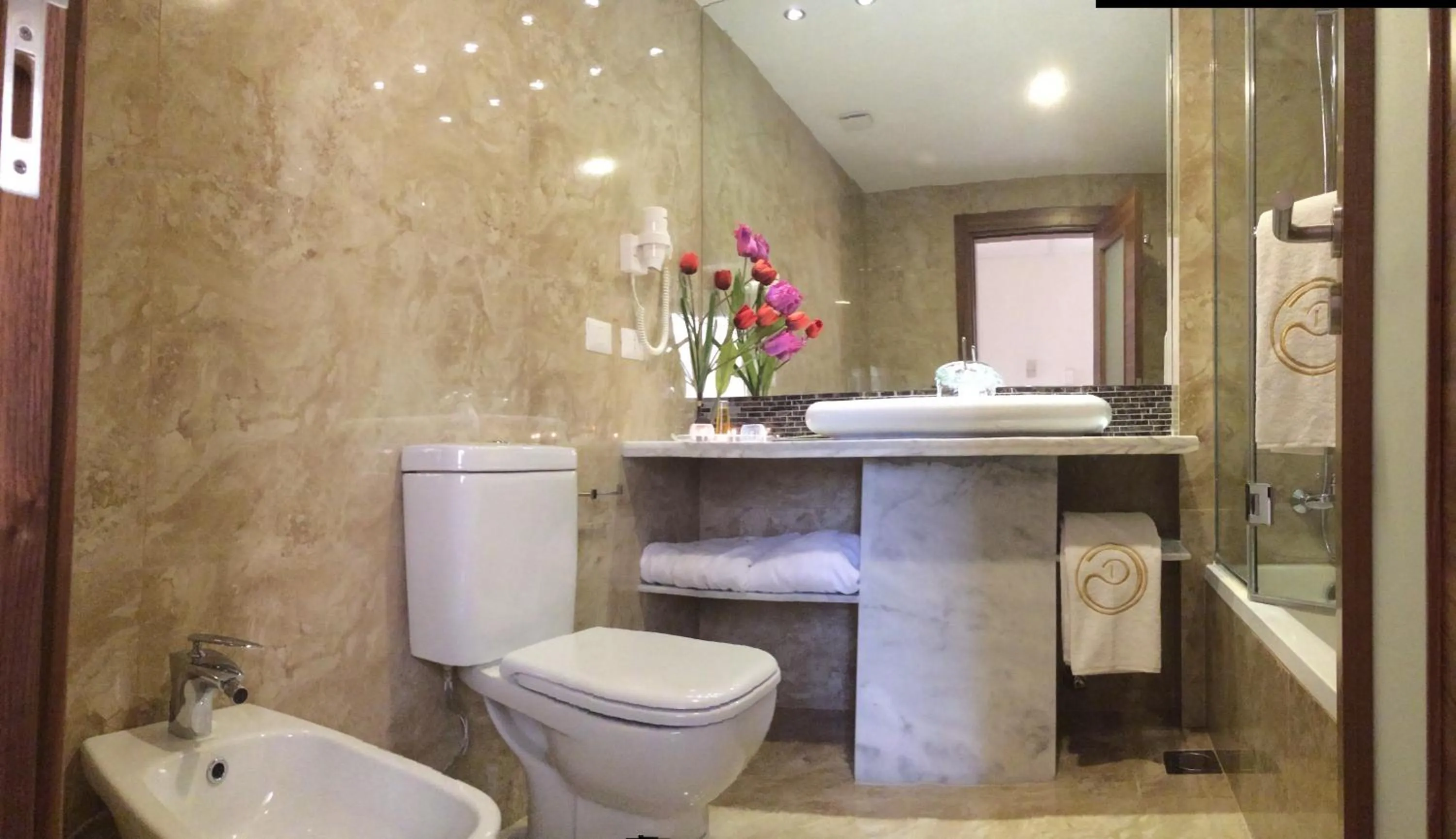 Bathroom in Delora Hotel and Suites