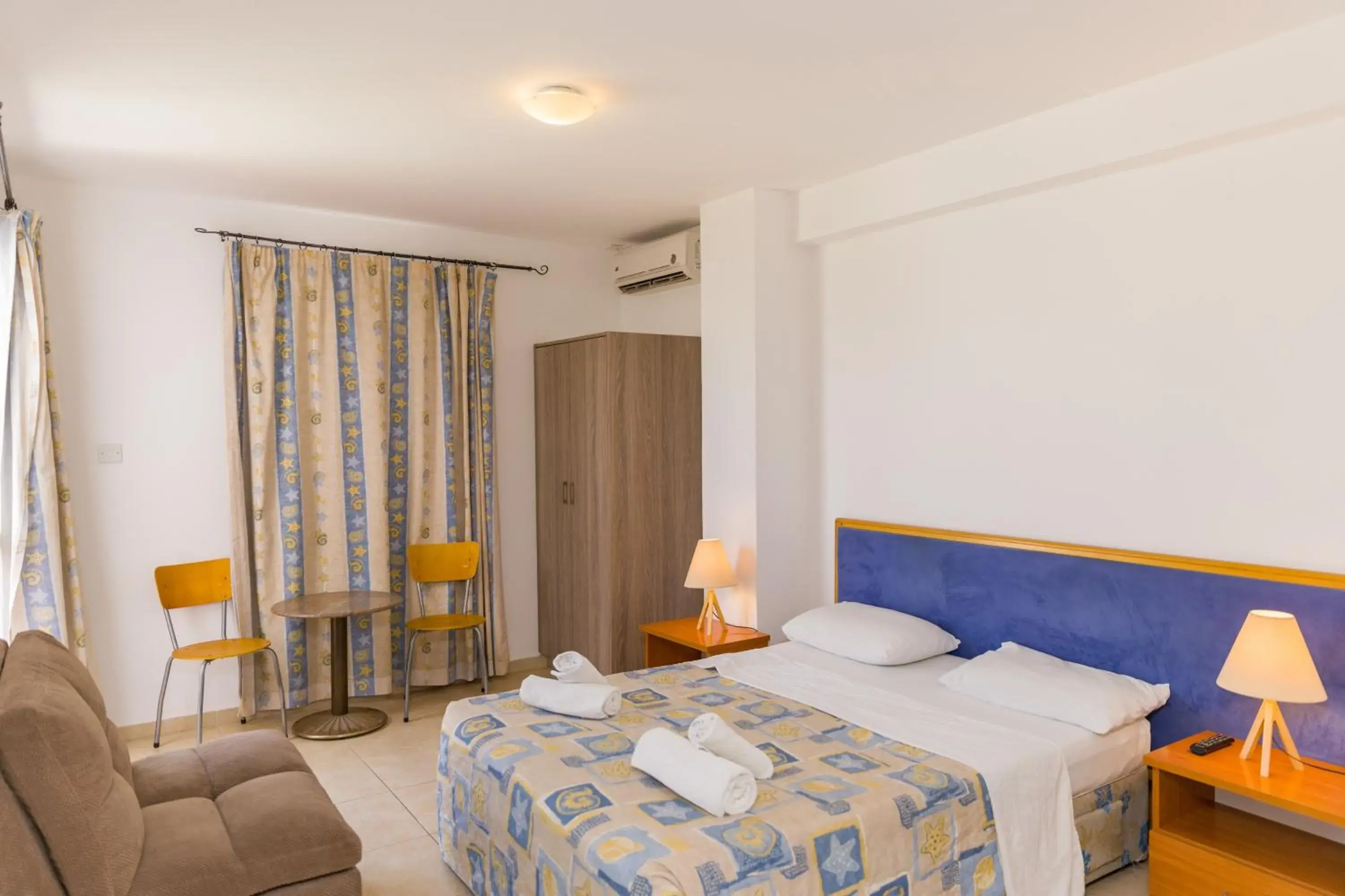 Photo of the whole room, Bed in Alecos Hotel Apartments Photo of the whole room, Bed in Alecos Hotel Apartments