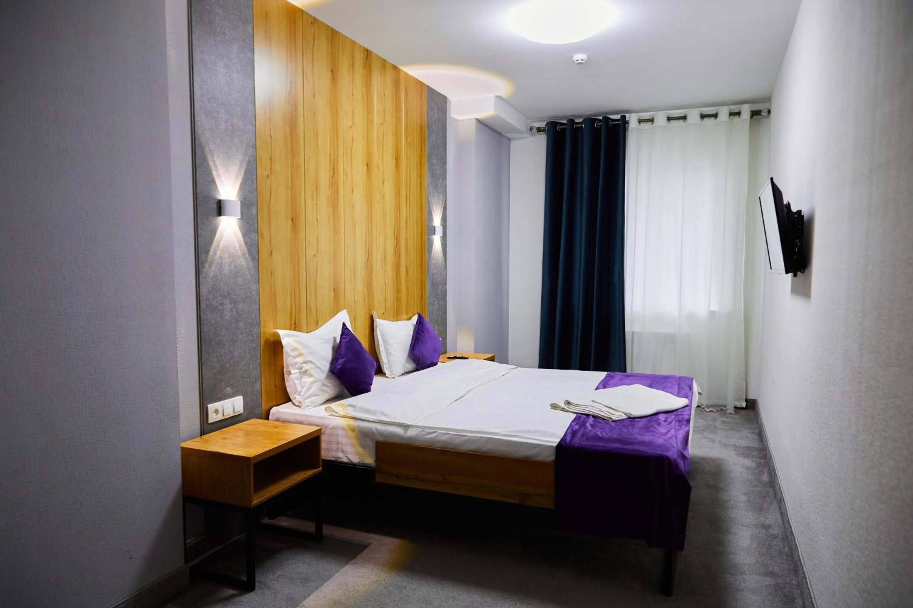 Bed in Art Plaza Hotel