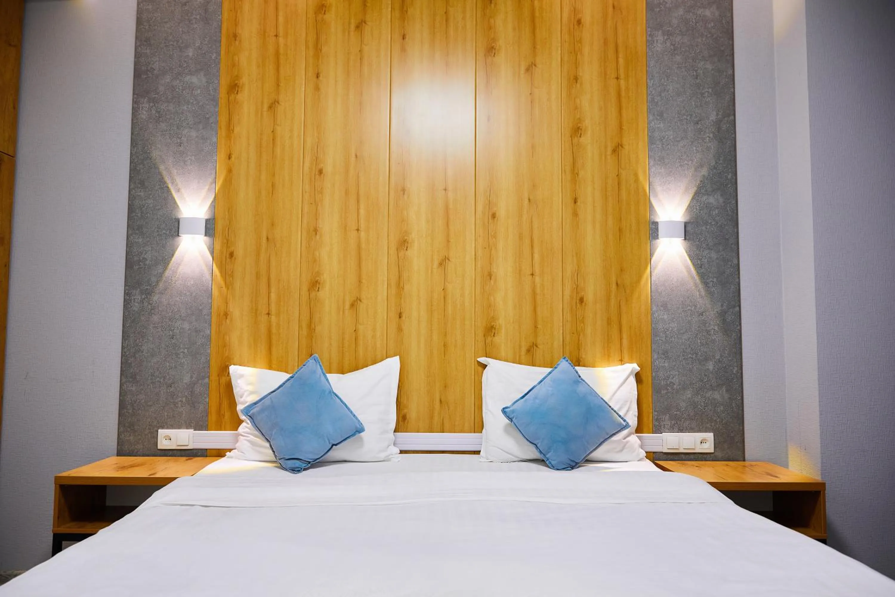 Bed in Art Plaza Hotel