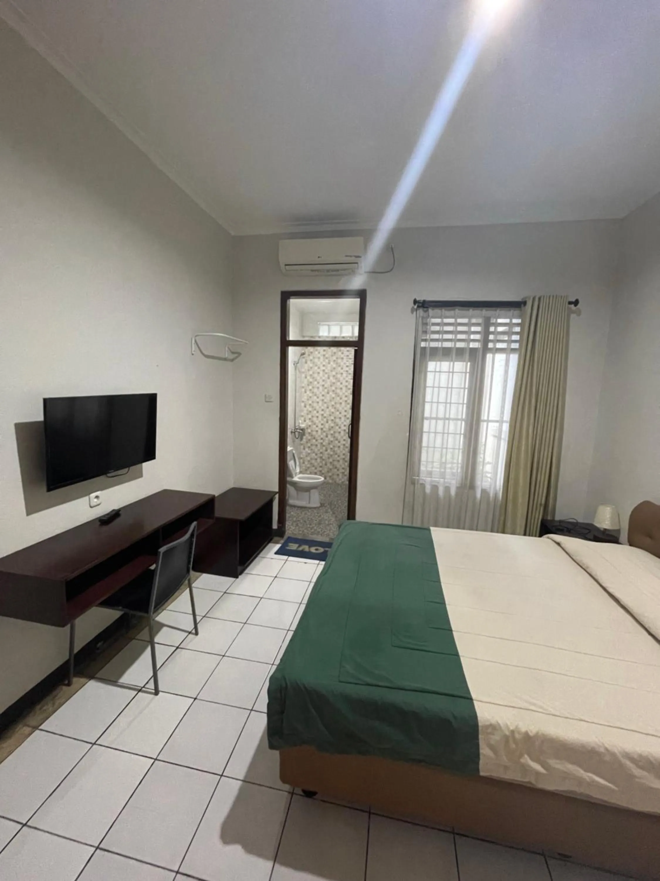 Bedroom in Hotel Gegerkalong Asri