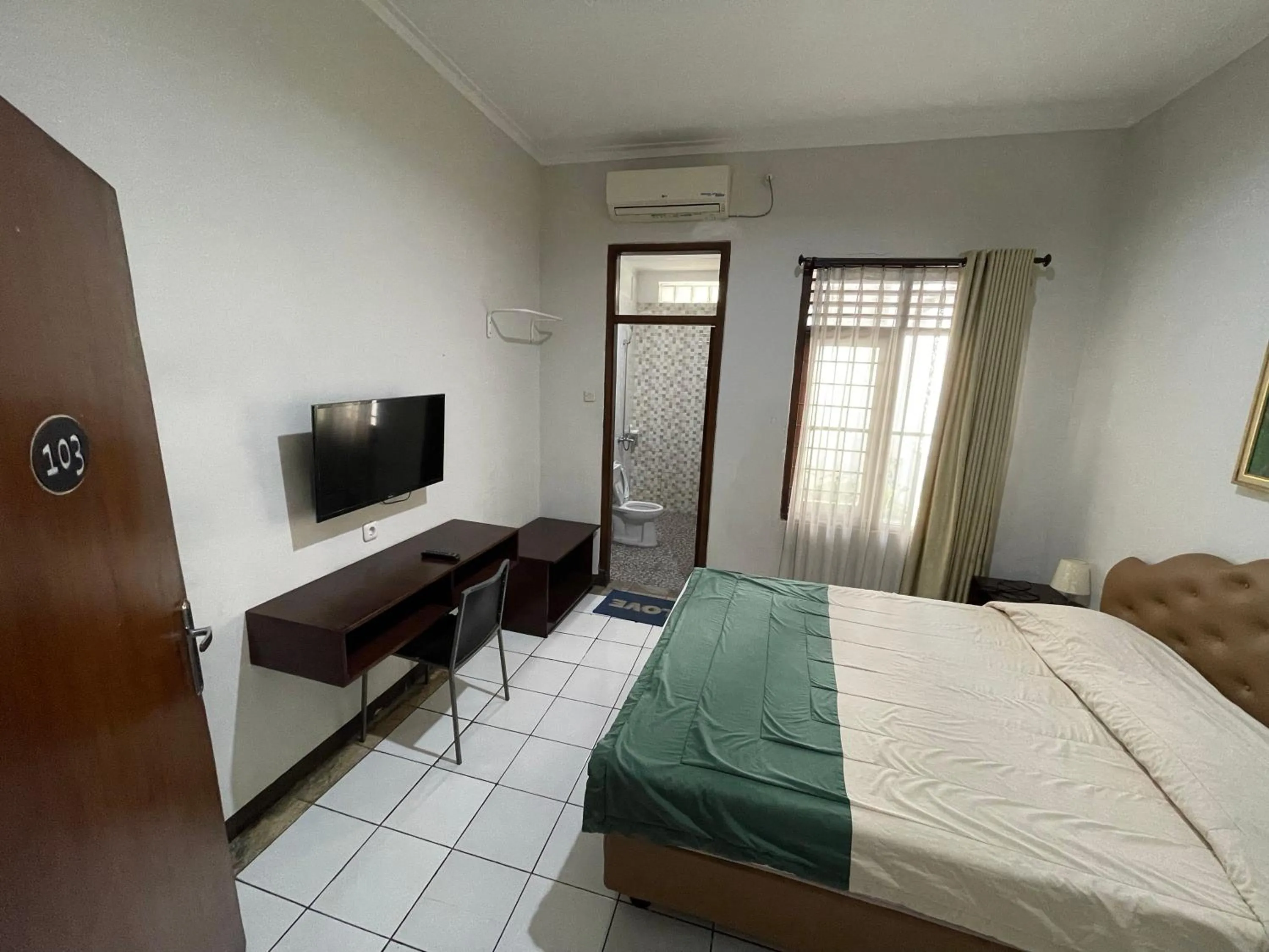 Bedroom in Hotel Gegerkalong Asri