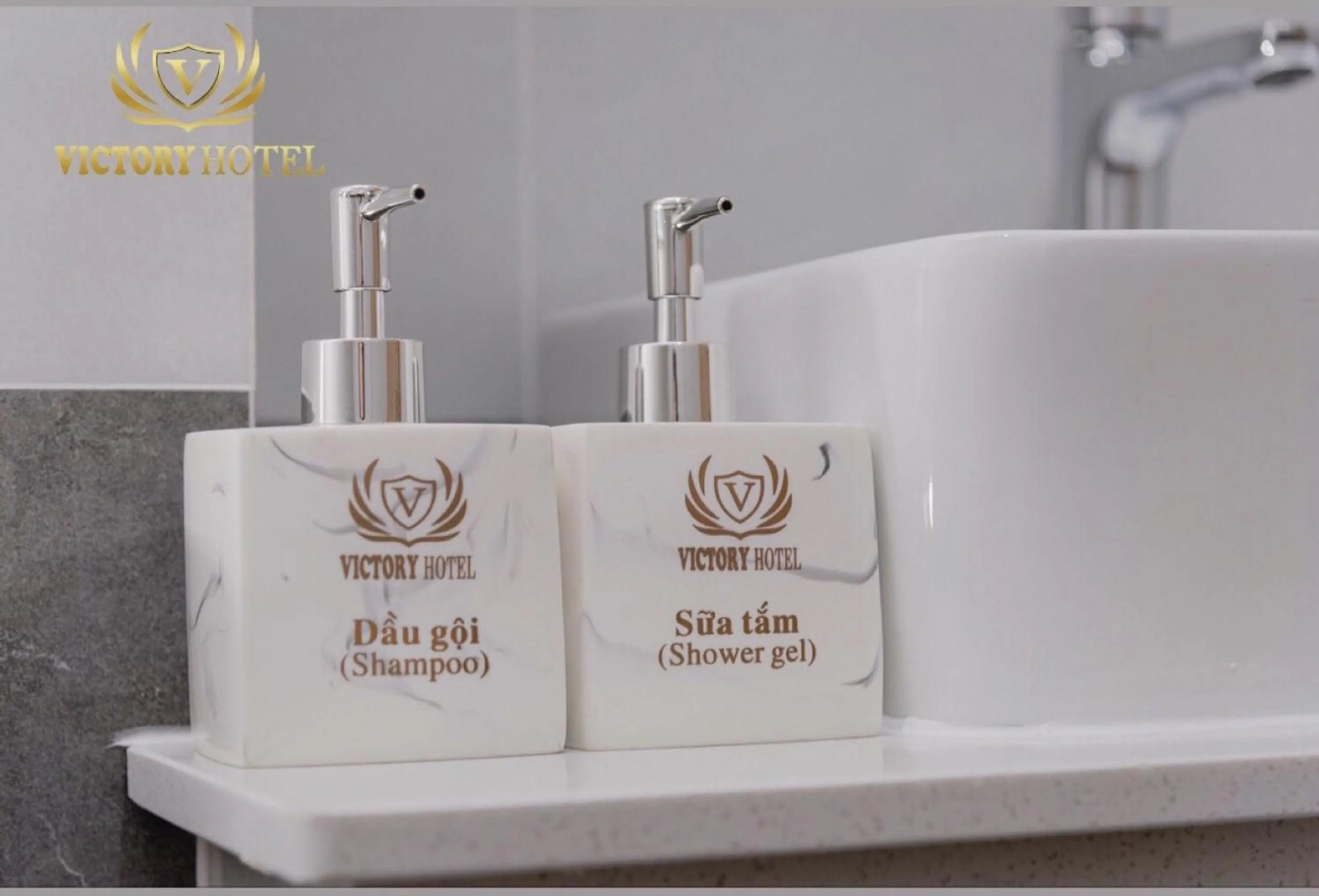 Property logo or sign in OYO 1192 Victory Hotel Dien Ban