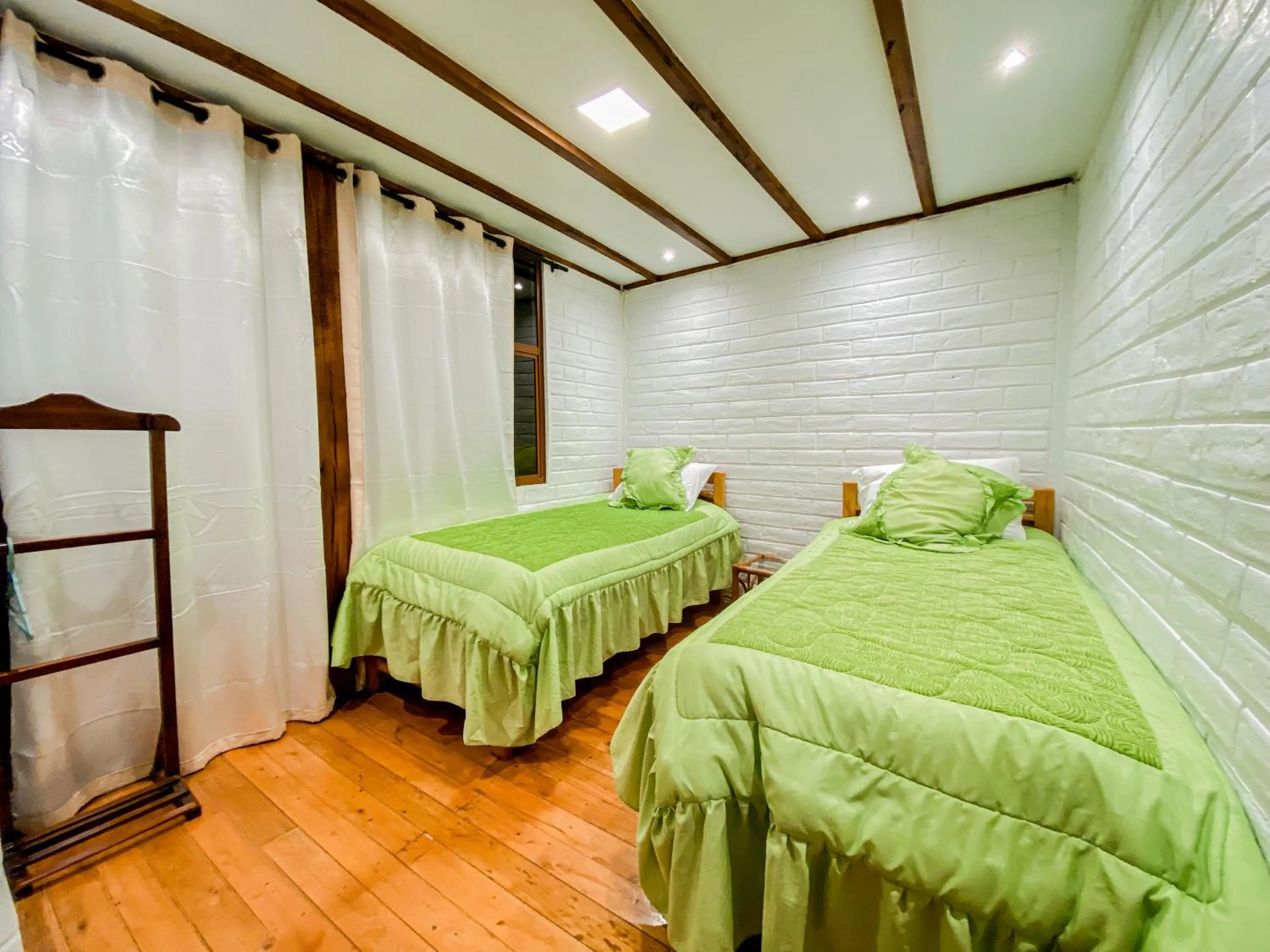 Photo of the whole room, Bed in Chuza Longa Home