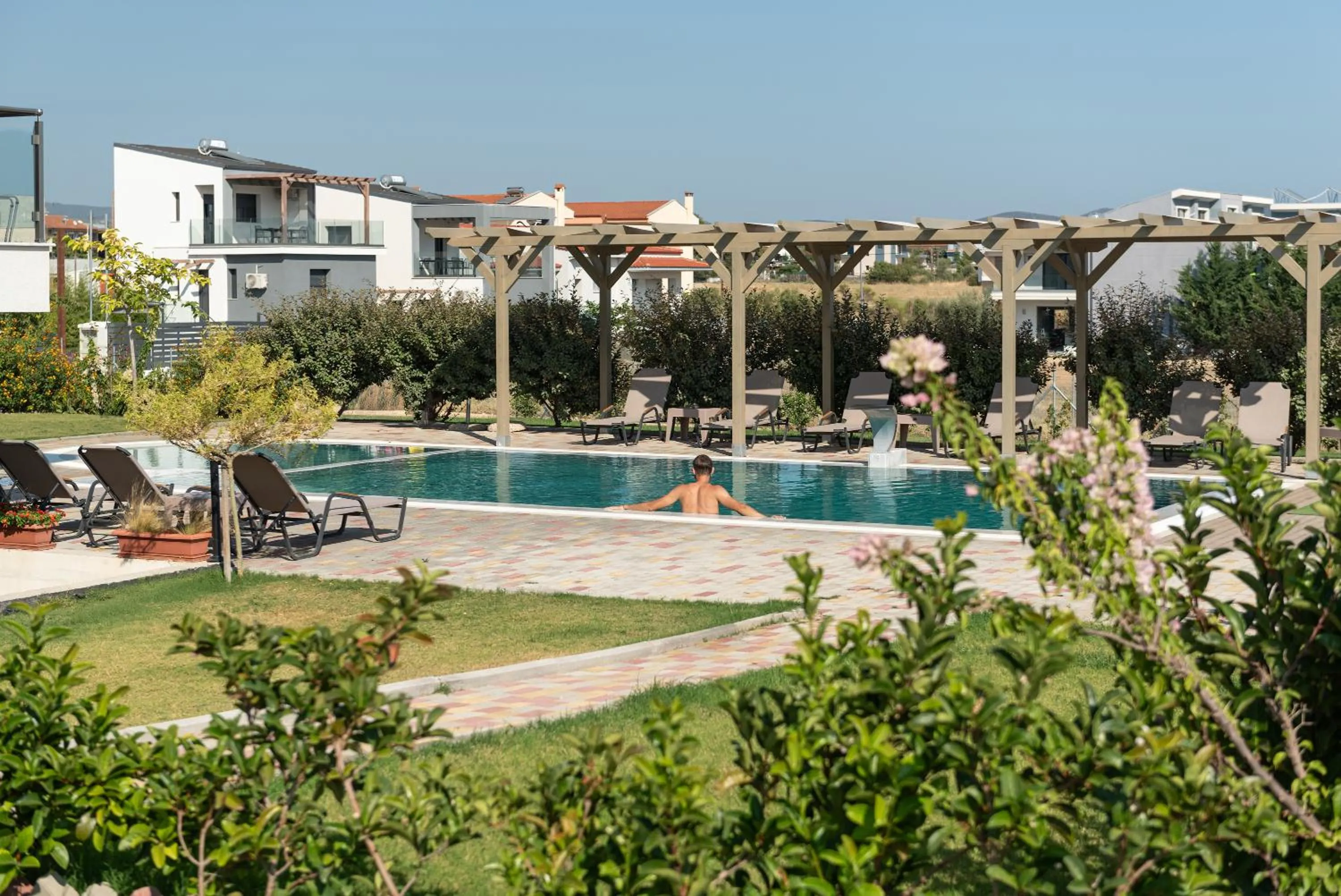 Swimming pool in Aetherion Studios & Suites