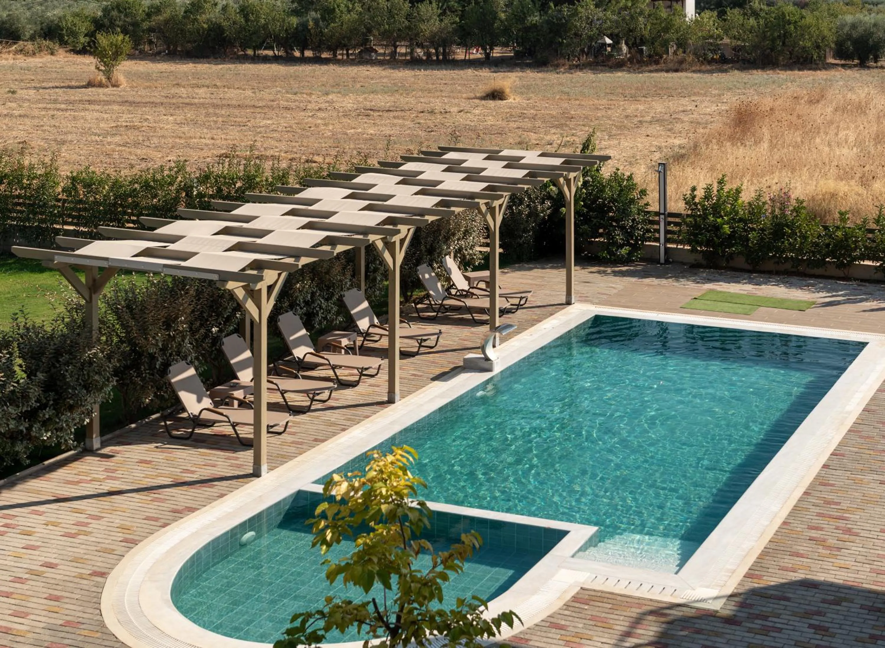 Swimming pool in Aetherion Studios & Suites