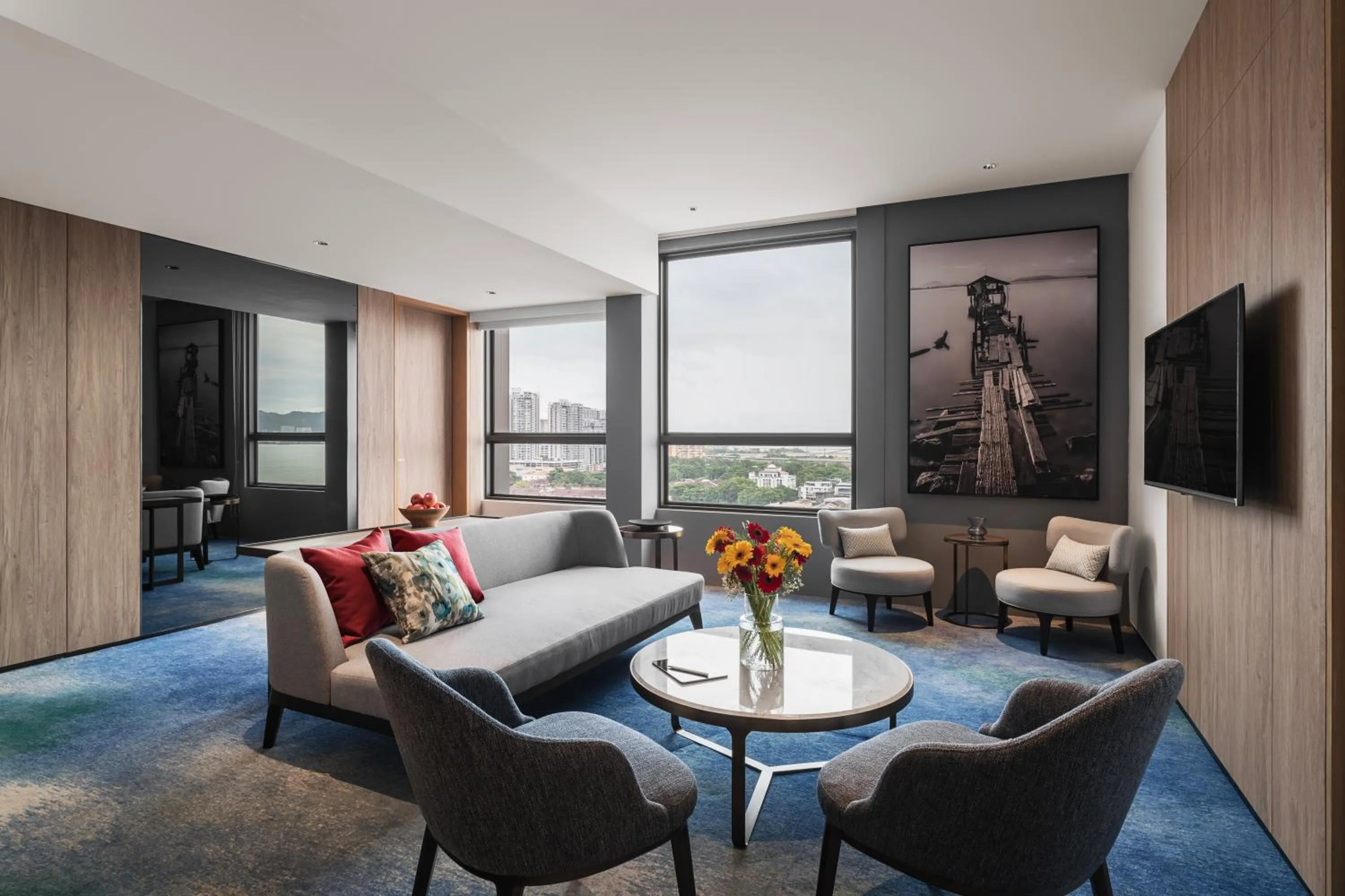 Living room in Crowne Plaza Penang Straits City by IHG