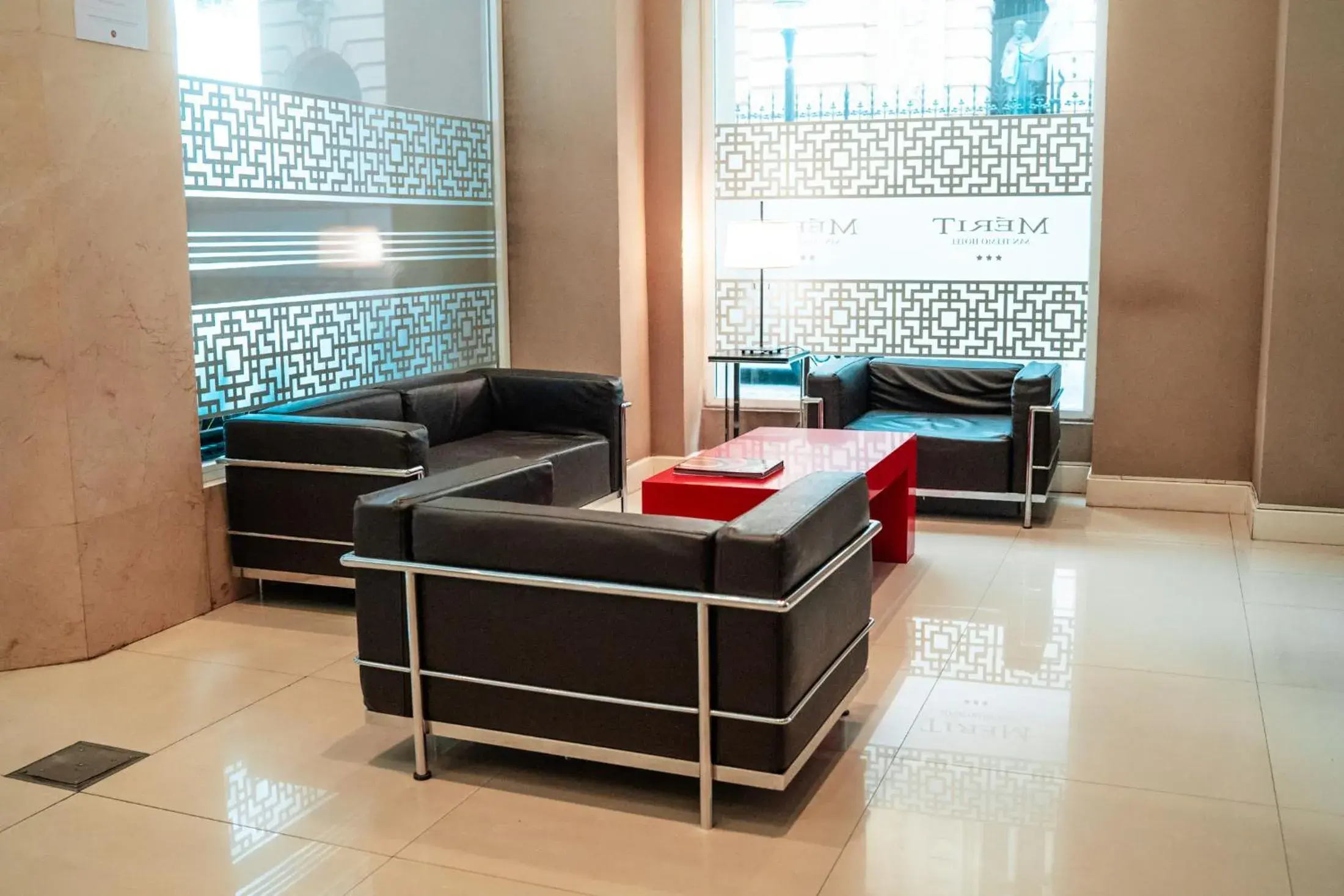 Lobby or reception in Mérit San Telmo by Amérian Lobby or reception in Mérit San Telmo by Amérian