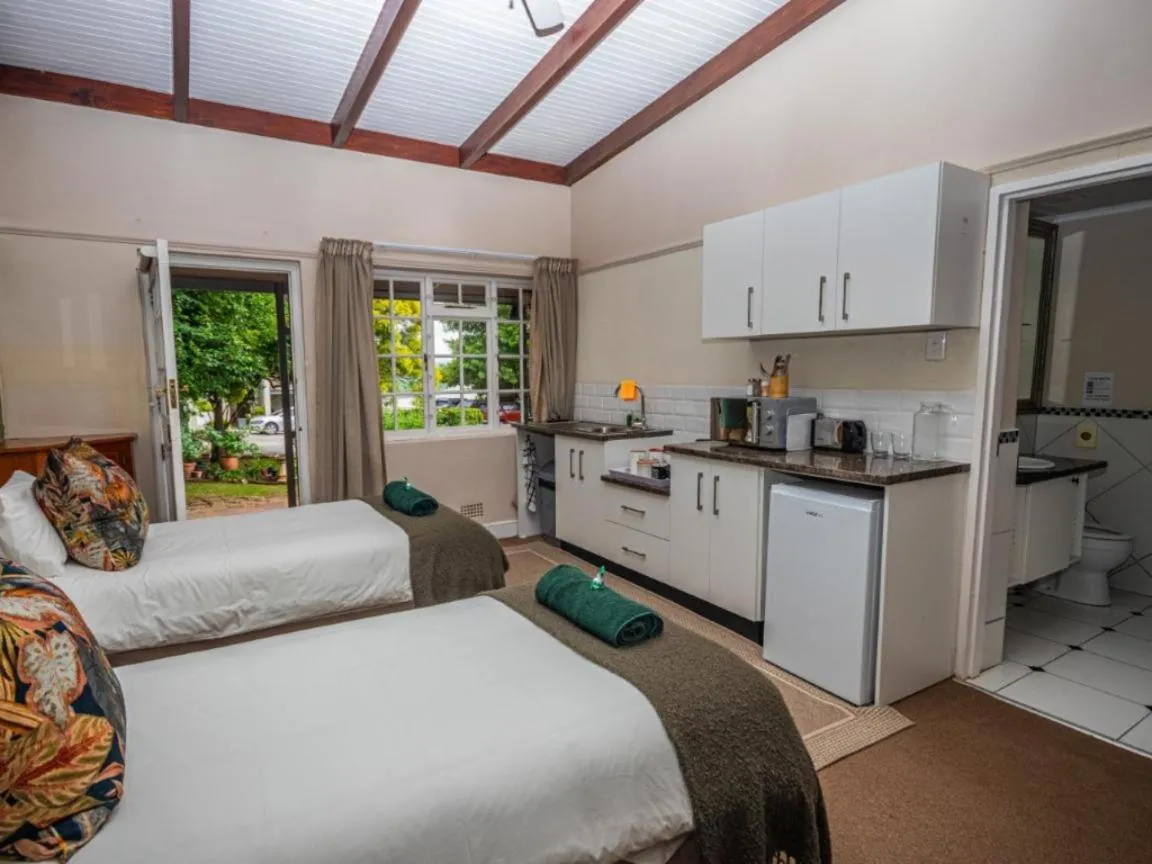 Photo of the whole room, Bed in The Cock House