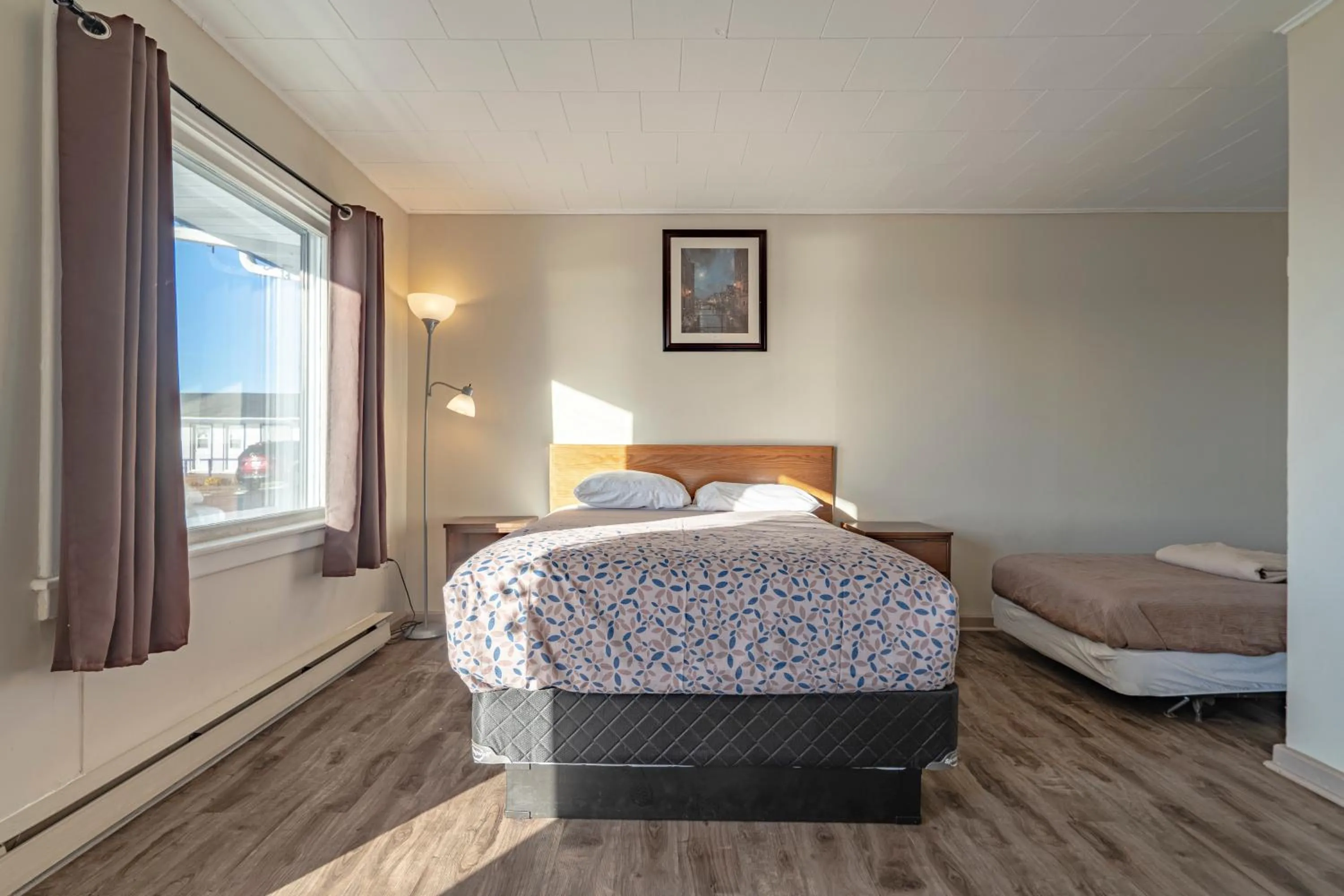 Bed in Novastar Motel On The Lake