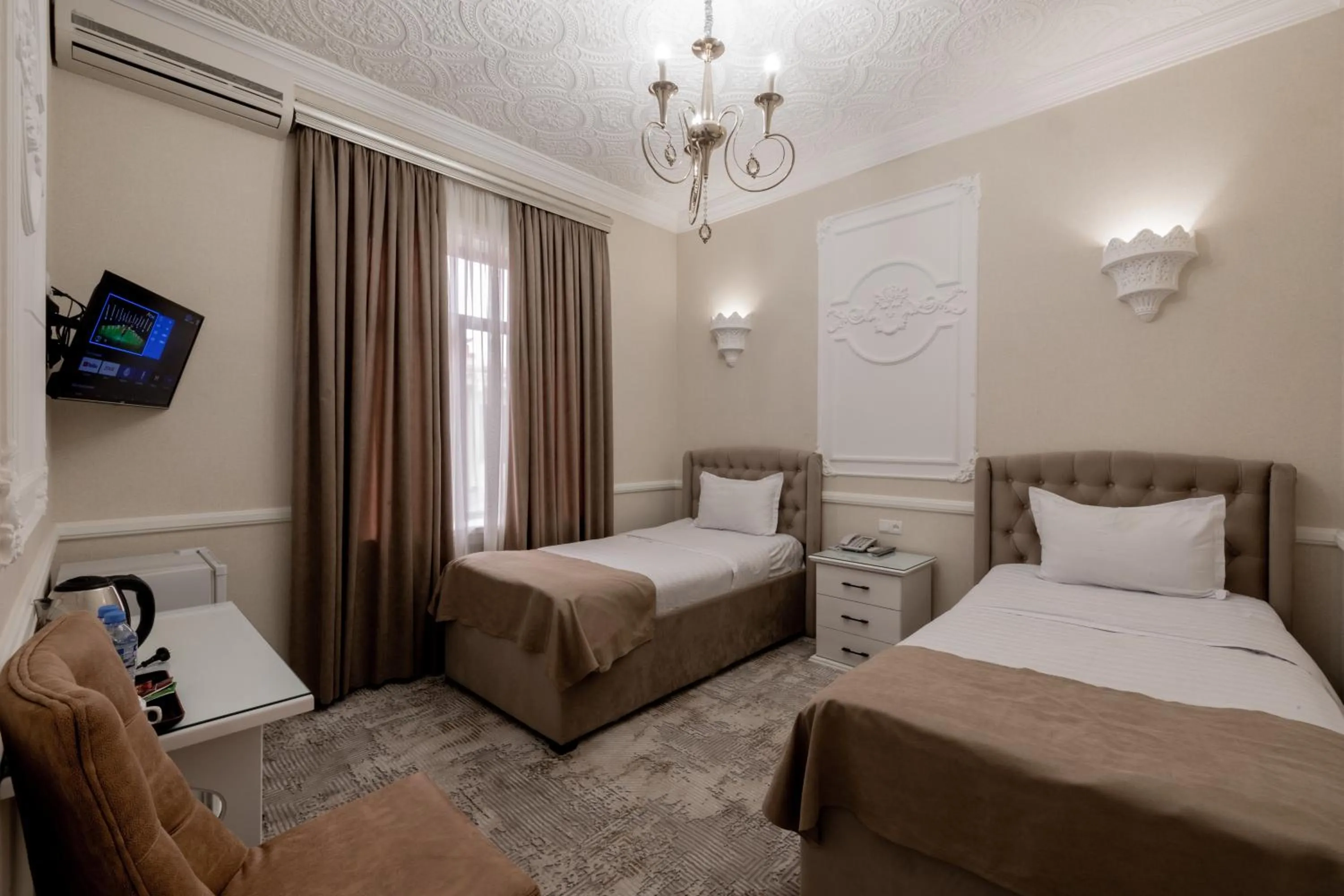 Bed in Hotel Billuri Sitora