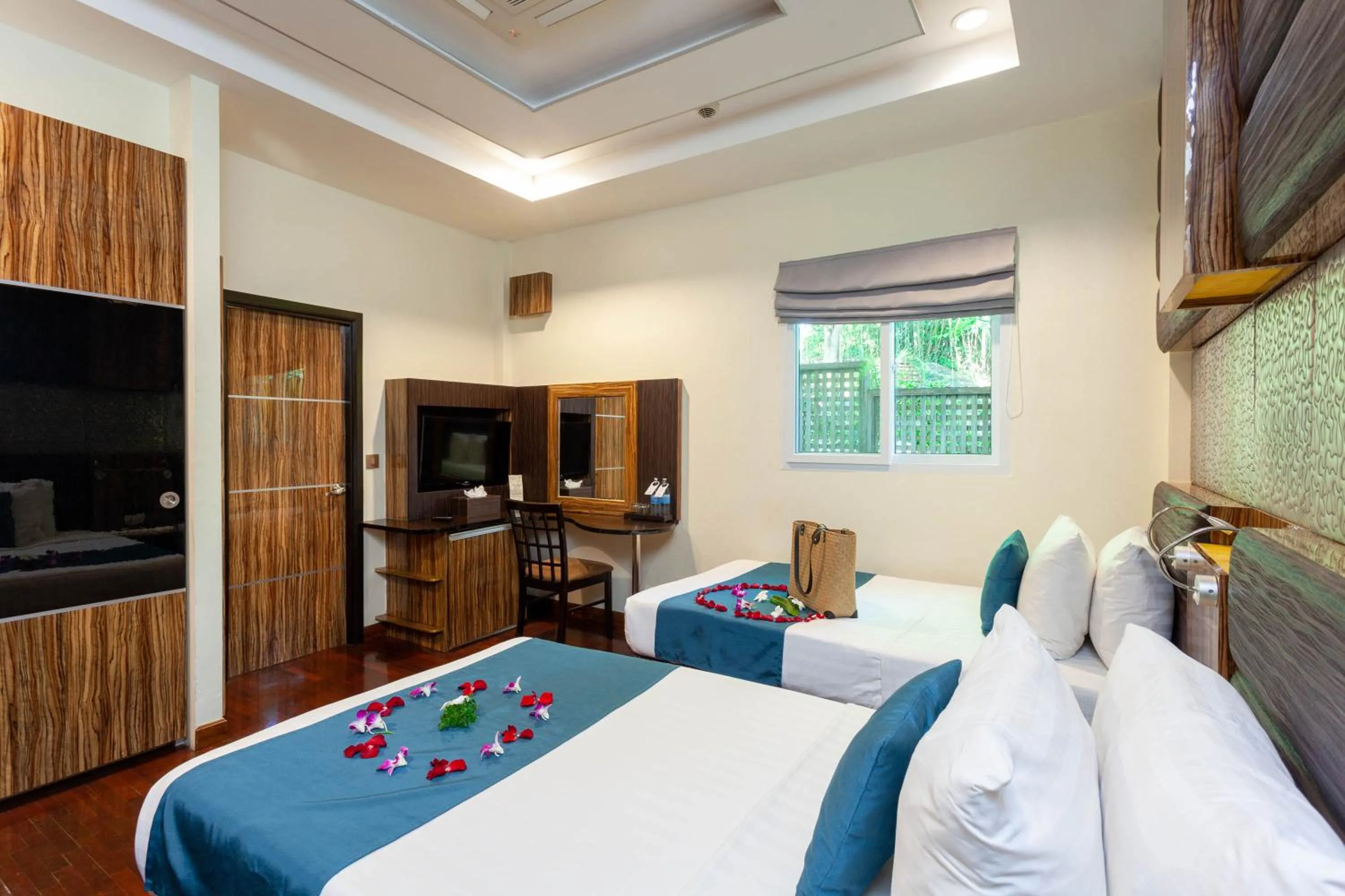 Bed in Royal Beach Boutique Resort & Spa Koh Samui