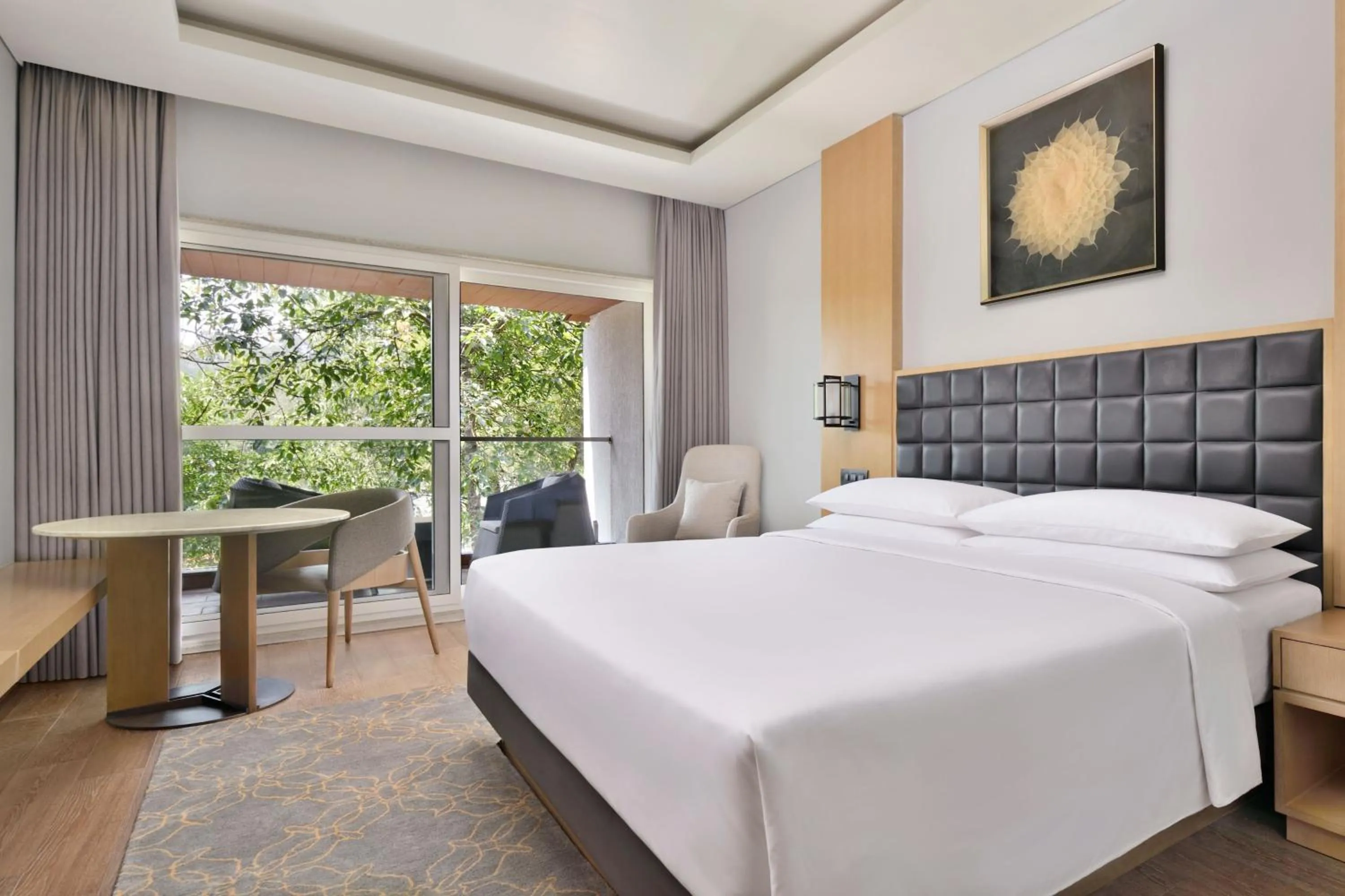 Photo of the whole room, Bed in Coorg Marriott Resort & Spa