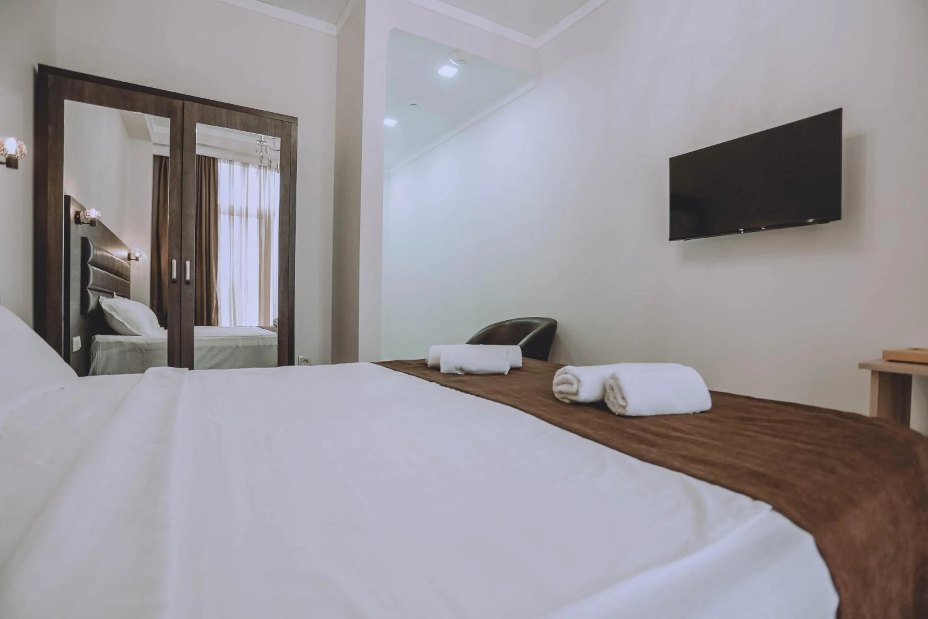 Bed in Royal Medis Hotel