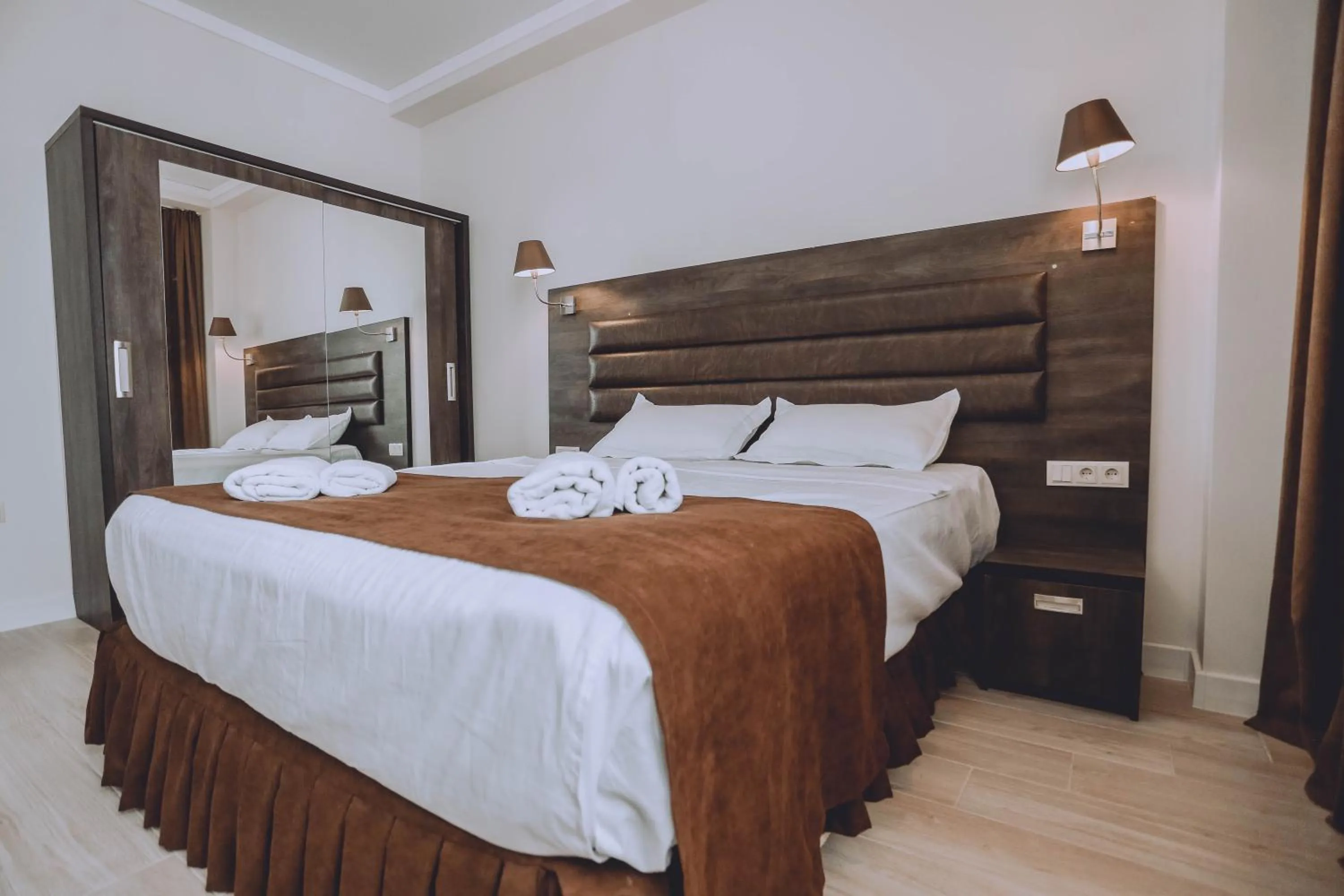 Bed in Royal Medis Hotel