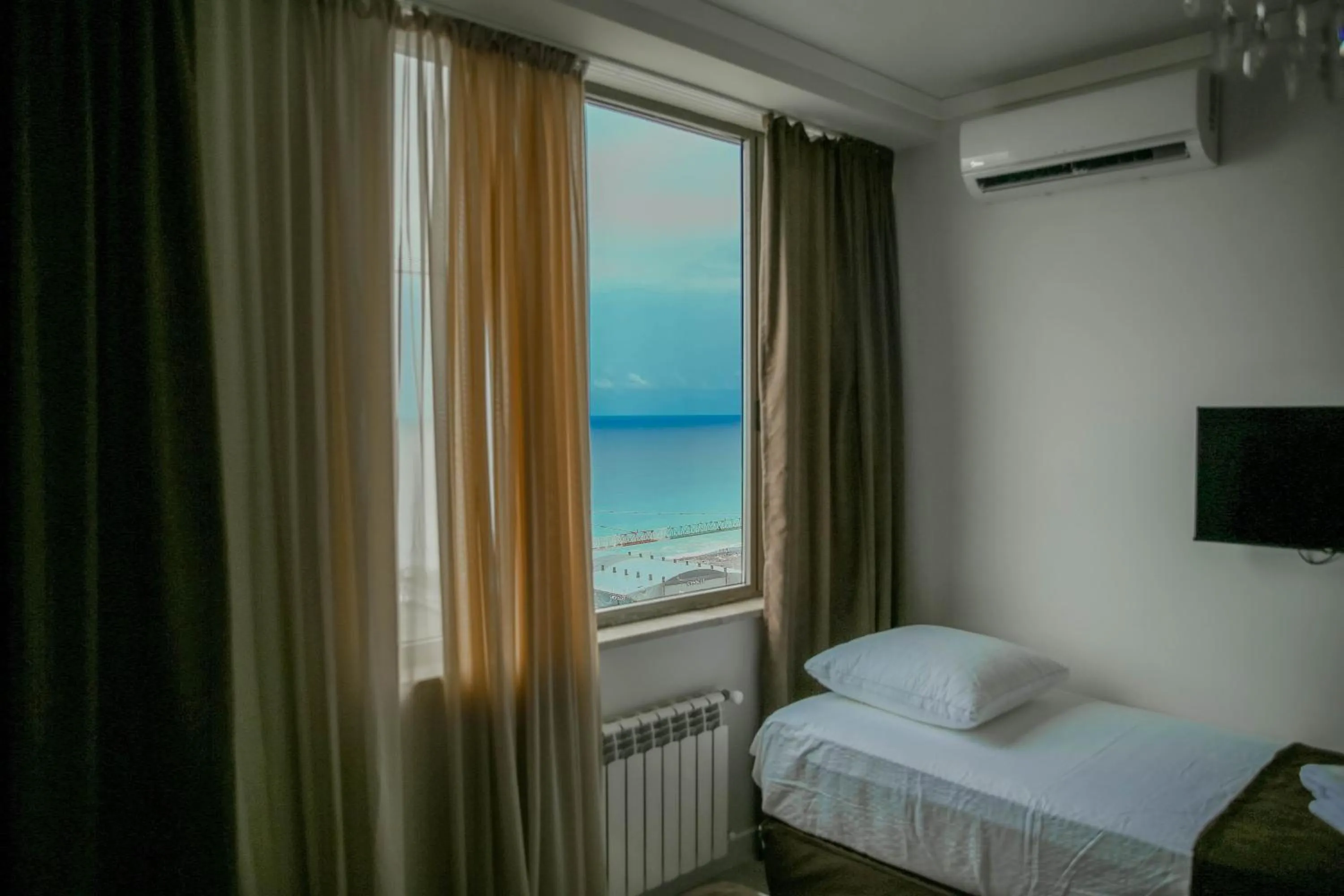 Bed in Royal Medis Hotel