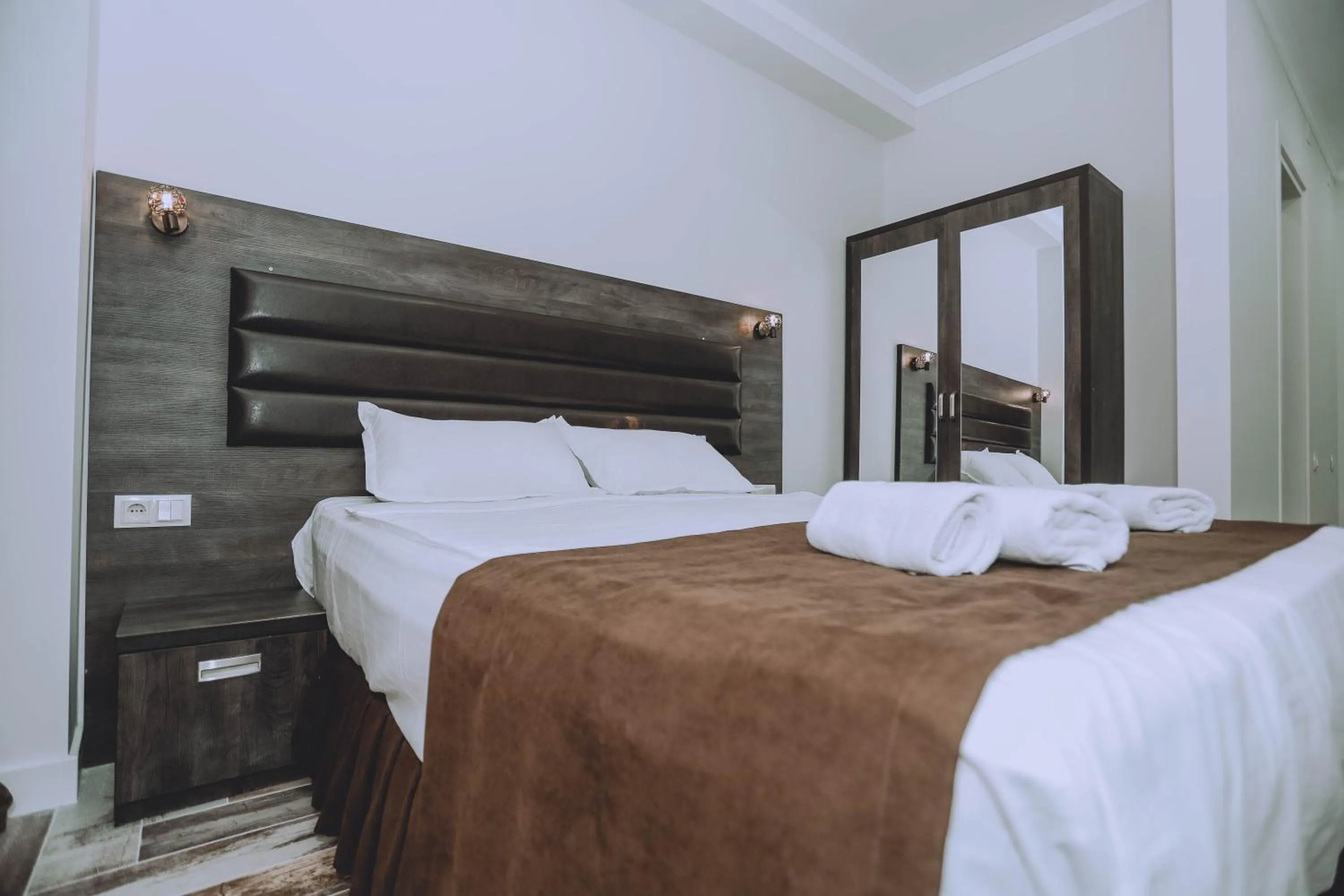 Bed in Royal Medis Hotel