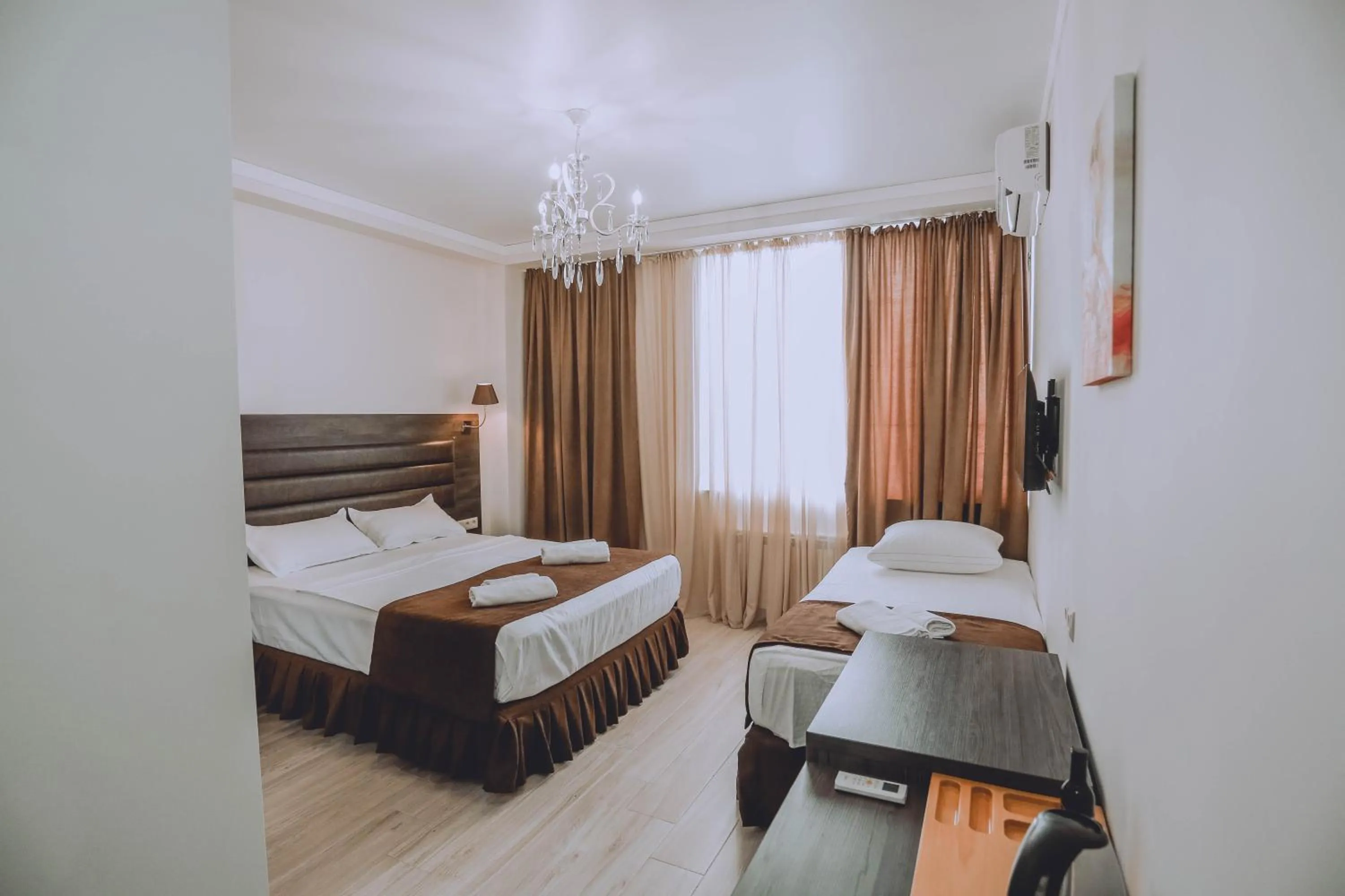 Bed in Royal Medis Hotel