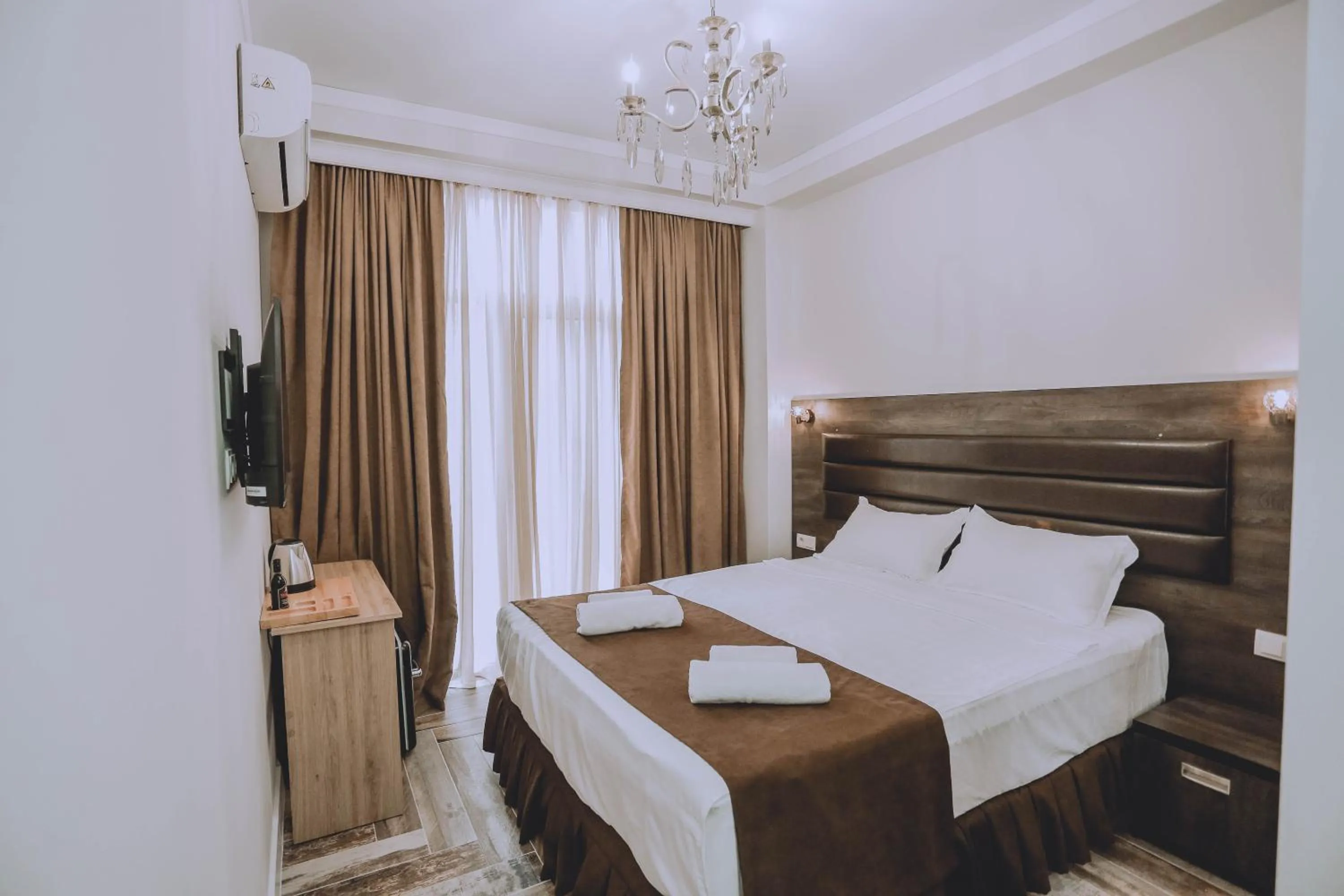 Bed in Royal Medis Hotel