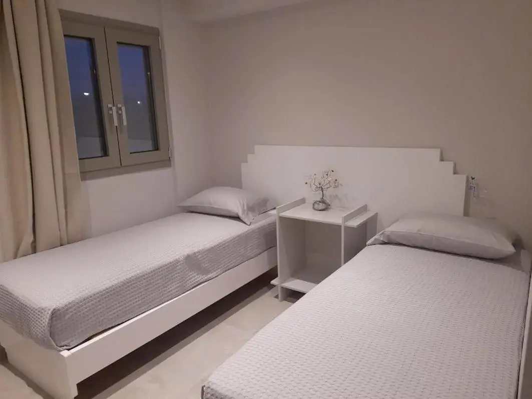 Deluxe Triple Room with Sea View in Evalia Apartments Deluxe Triple Room with Sea View in Evalia Apartments