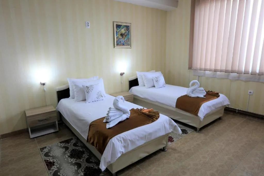 Bed in Hotel Saradis