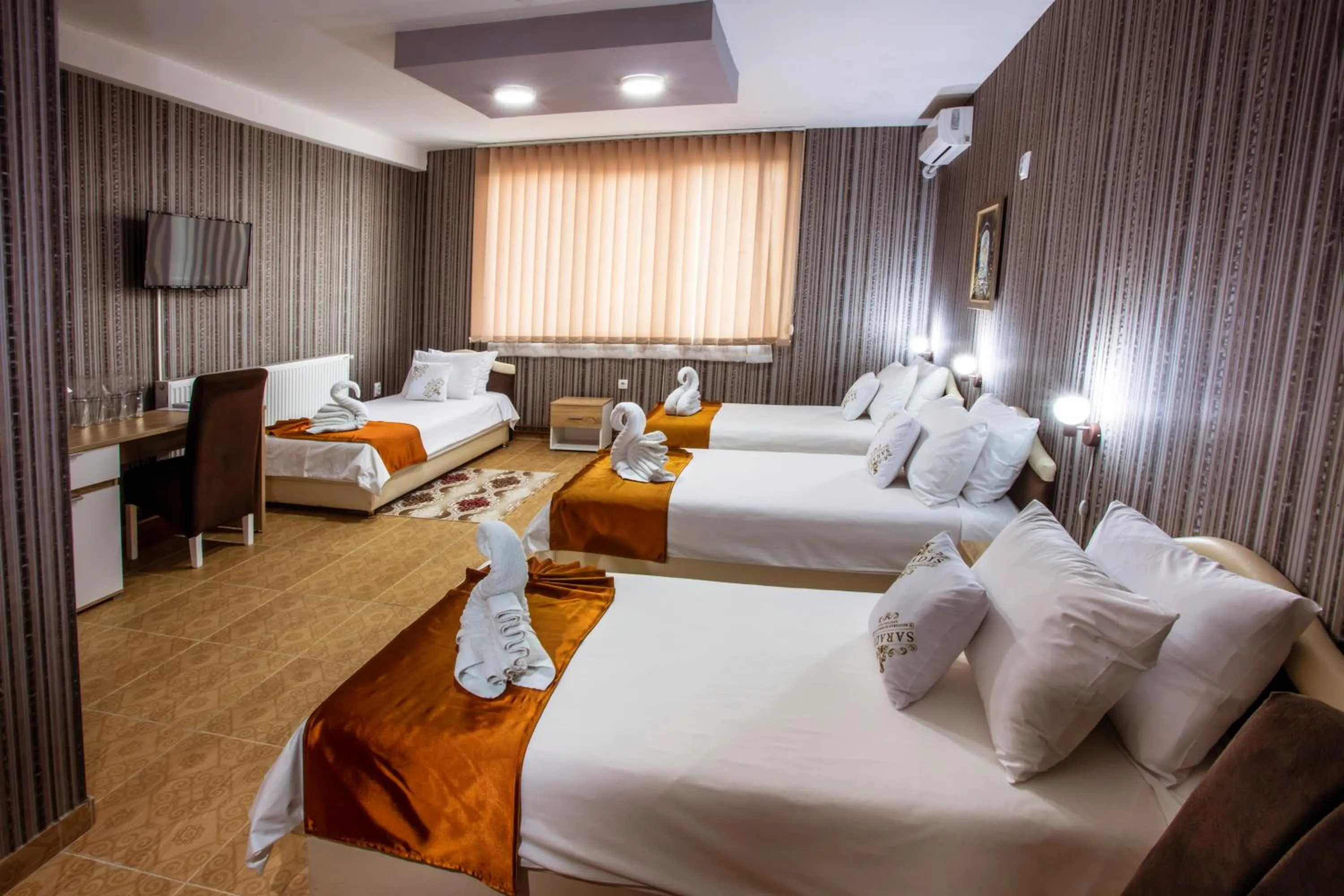 Bed in Hotel Saradis