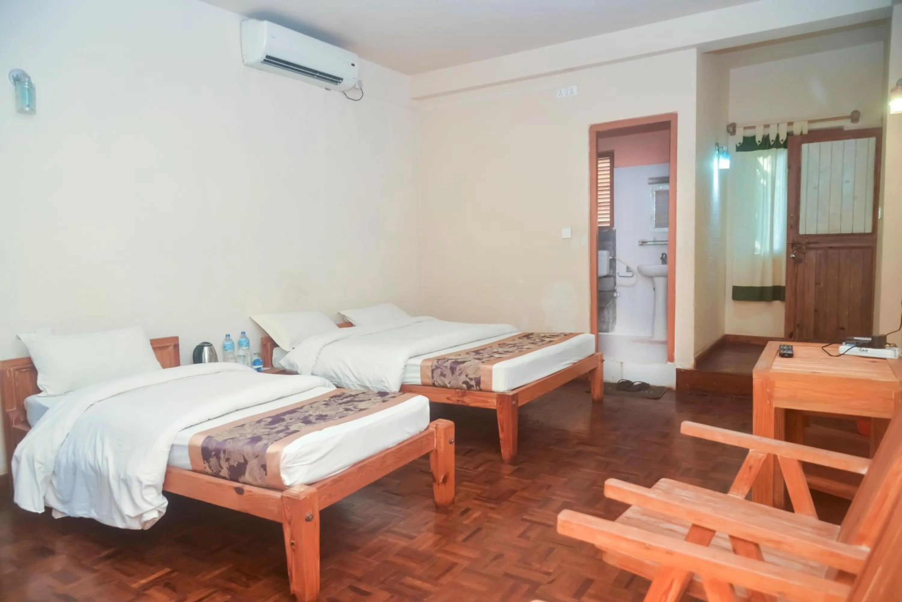 Bedroom, Bed in Chitwan Paradise Hotel