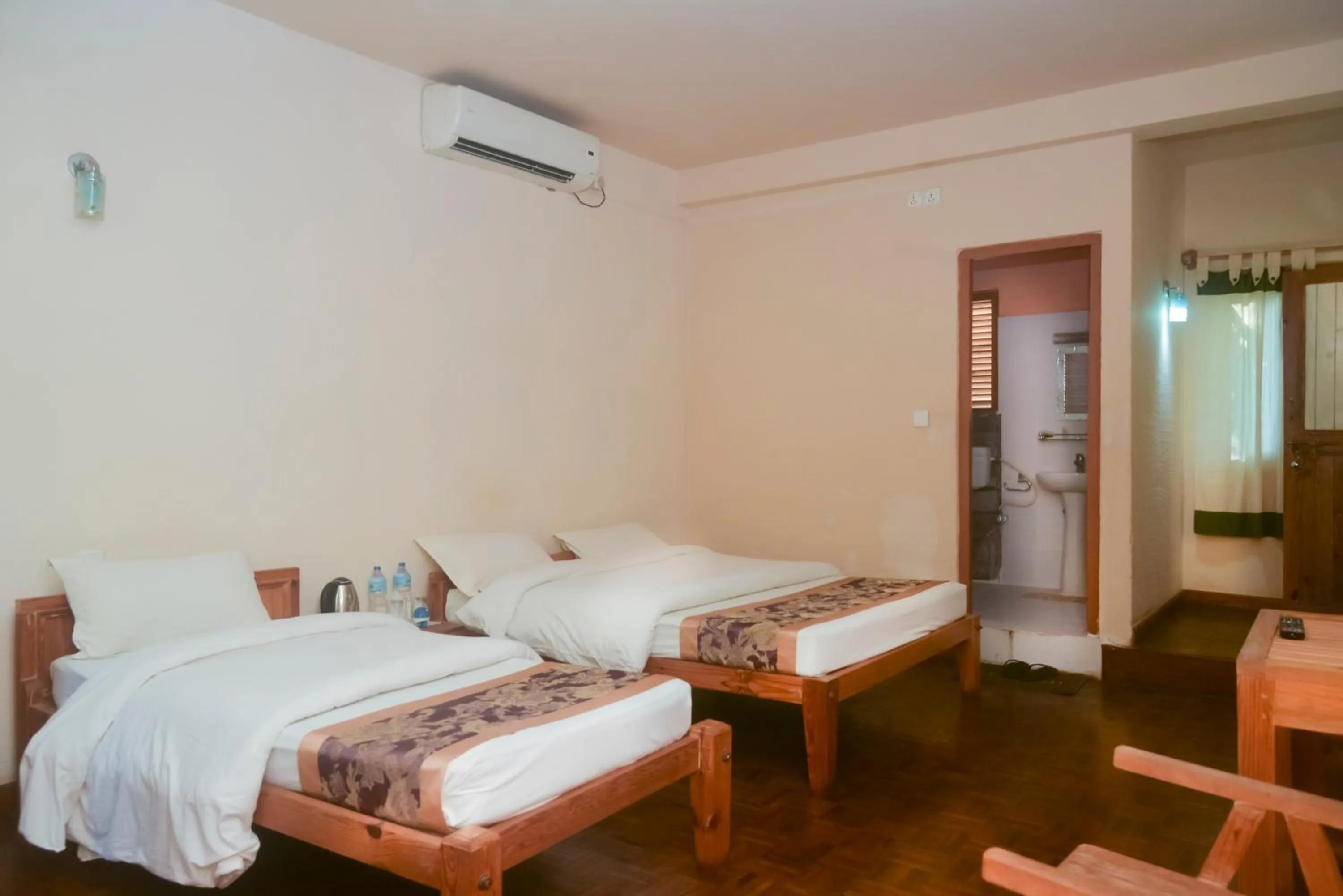 Bedroom, Bed in Chitwan Paradise Hotel